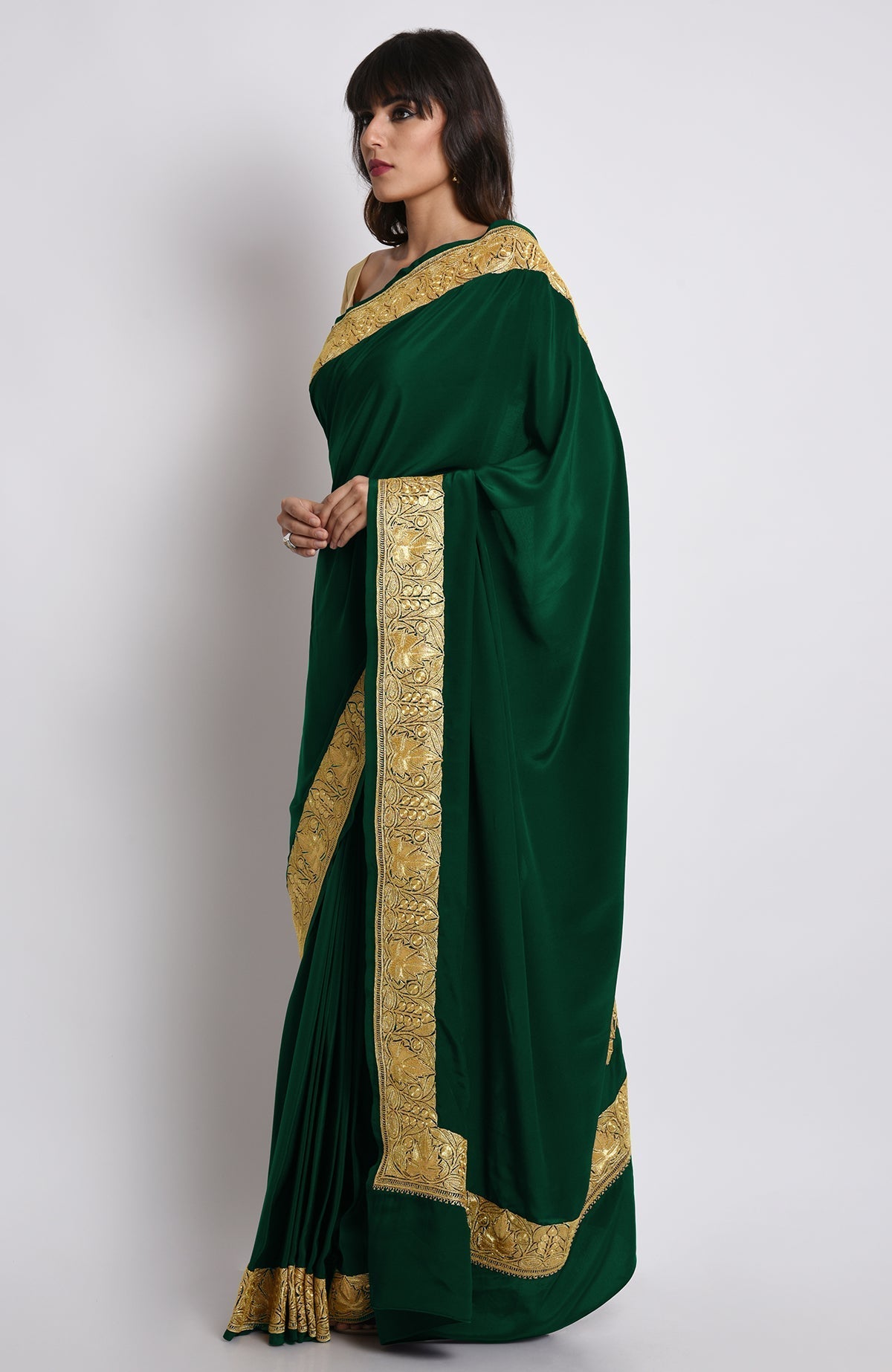 Burgundy pure crepe saree with gold Kashmiri tilla embroidery on pallav and borders