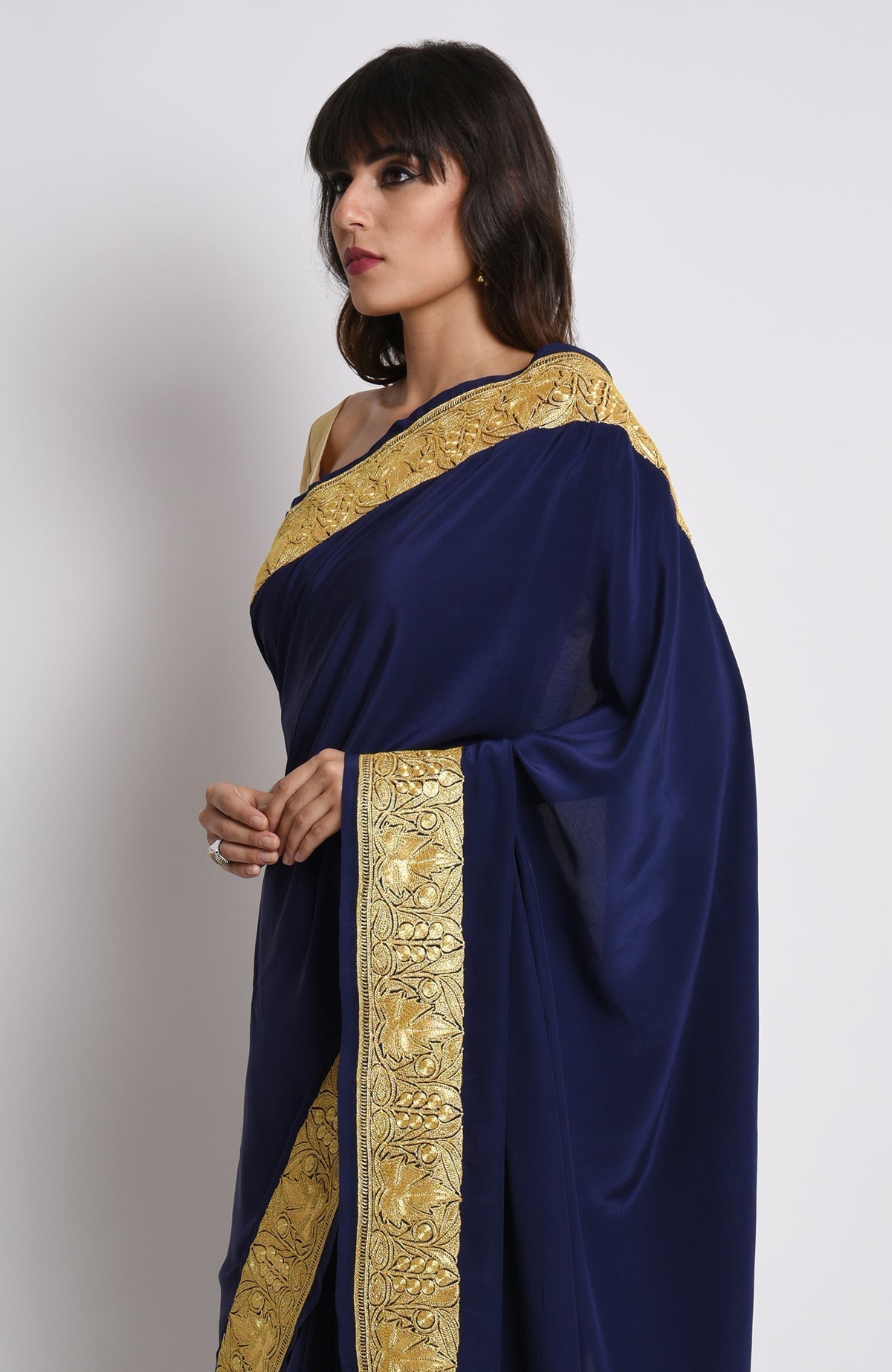 Midnight blue pure crepe saree with gold Kashmiri tilla embroidery on pallav and borders