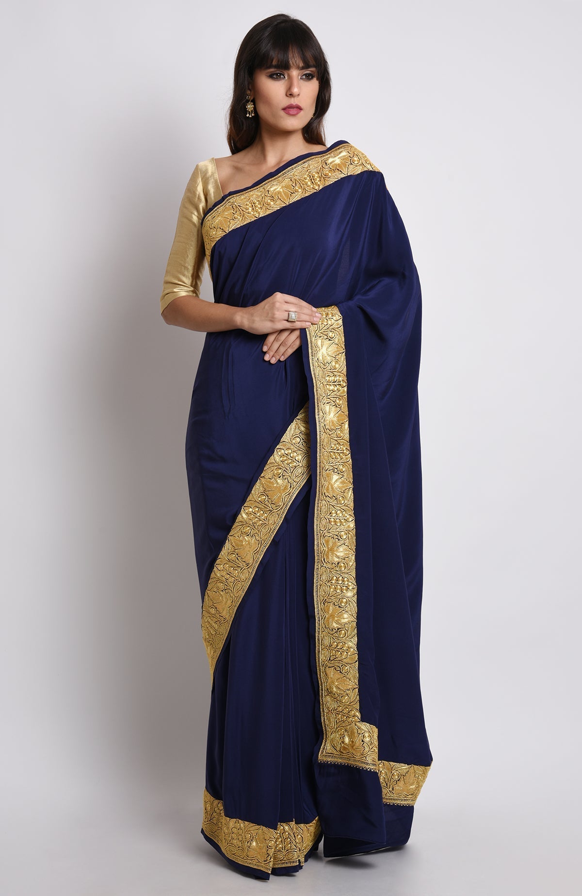 Midnight blue pure crepe saree with gold Kashmiri tilla embroidery on pallav and borders