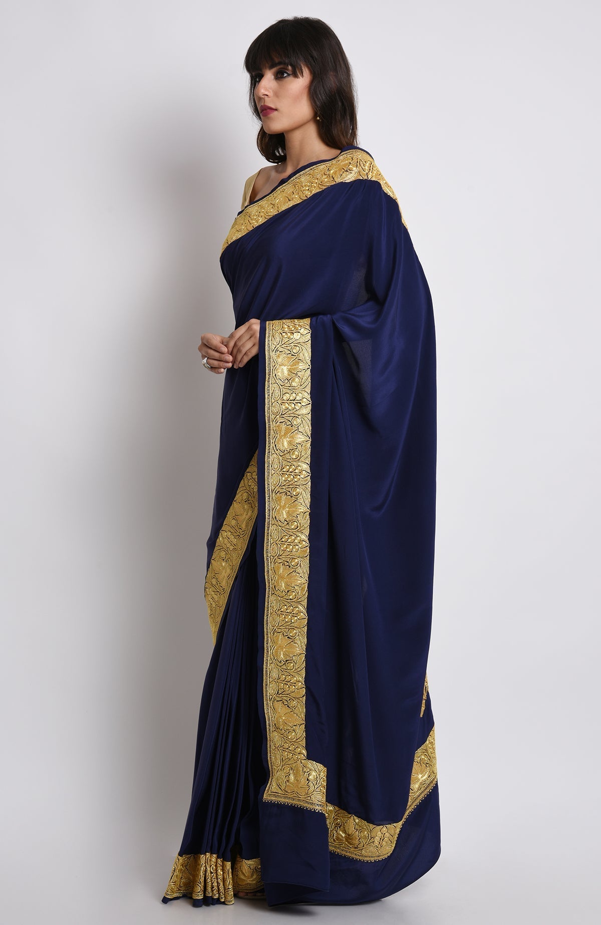 Midnight blue pure crepe saree with gold Kashmiri tilla embroidery on pallav and borders