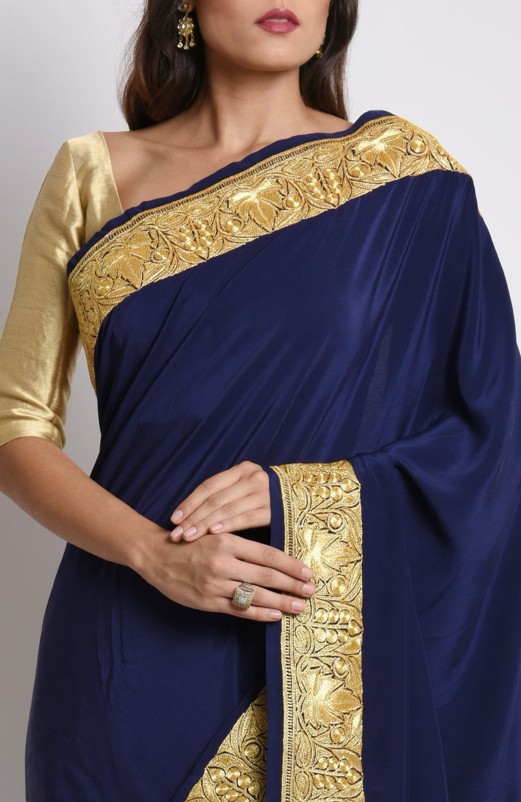Midnight blue pure crepe saree with gold Kashmiri tilla embroidery on pallav and borders