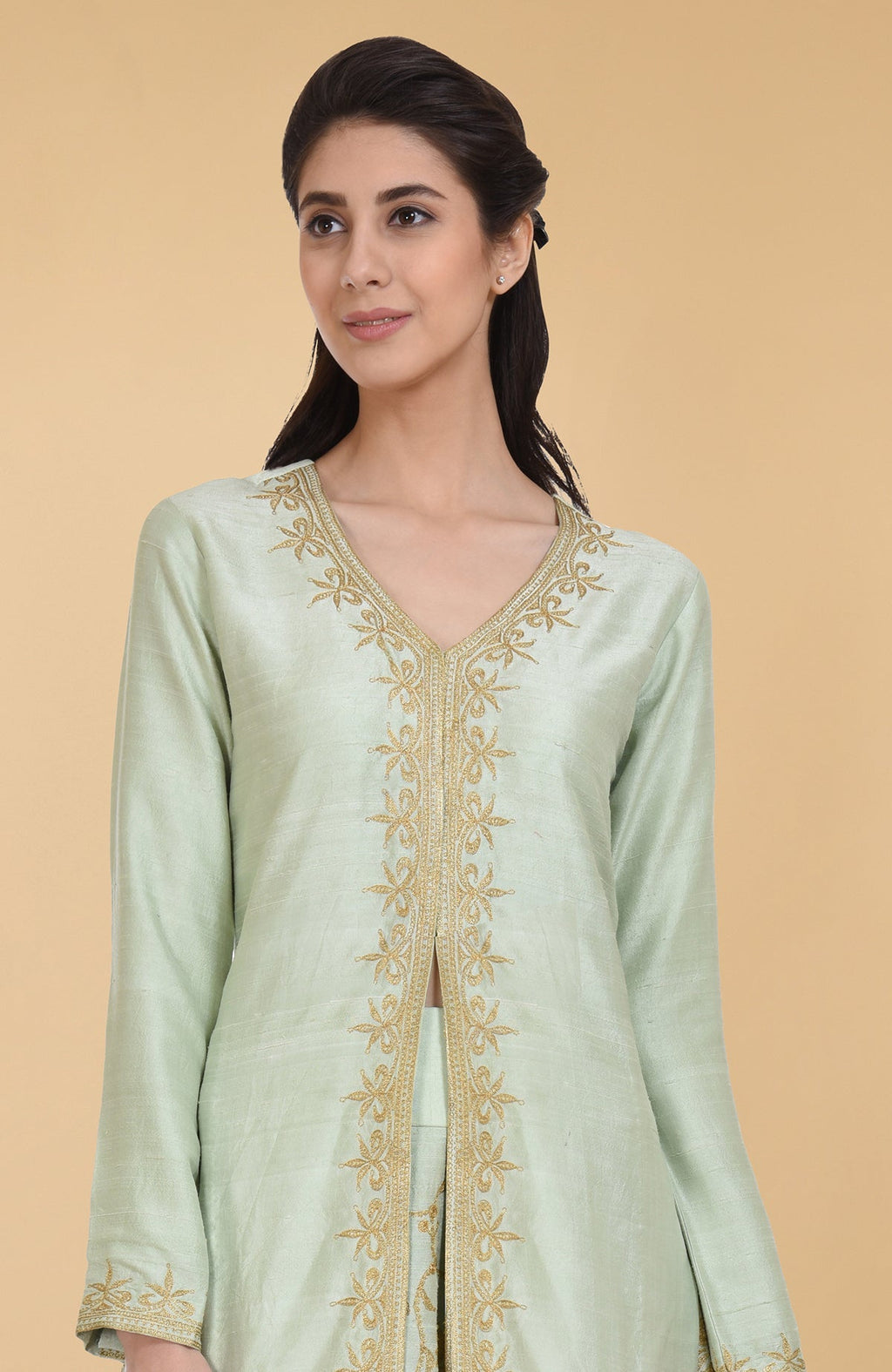 Sage green raw silk lehenga set with gold Kashmiri tilla aari embroidery and net dupatta