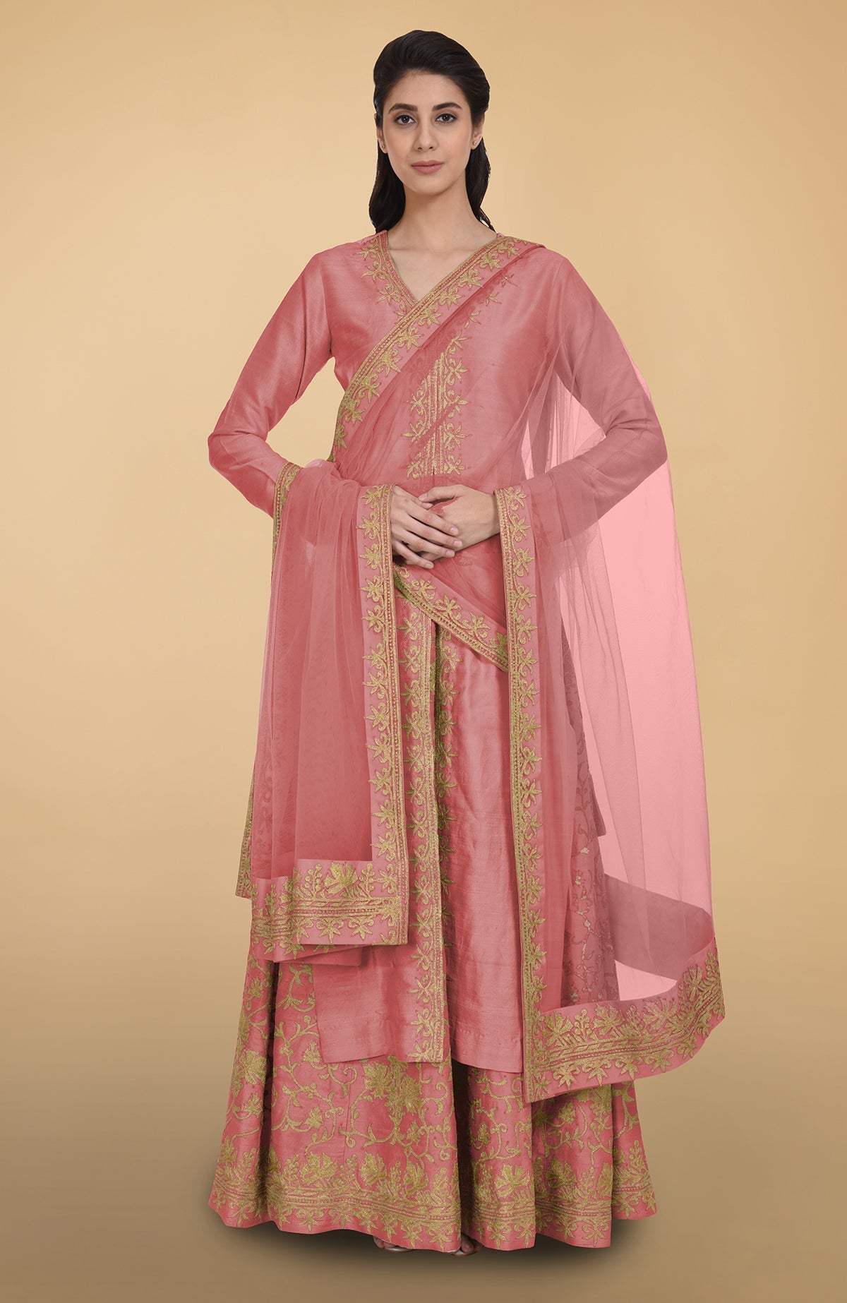 Sage green raw silk lehenga set with gold Kashmiri tilla aari embroidery and net dupatta.