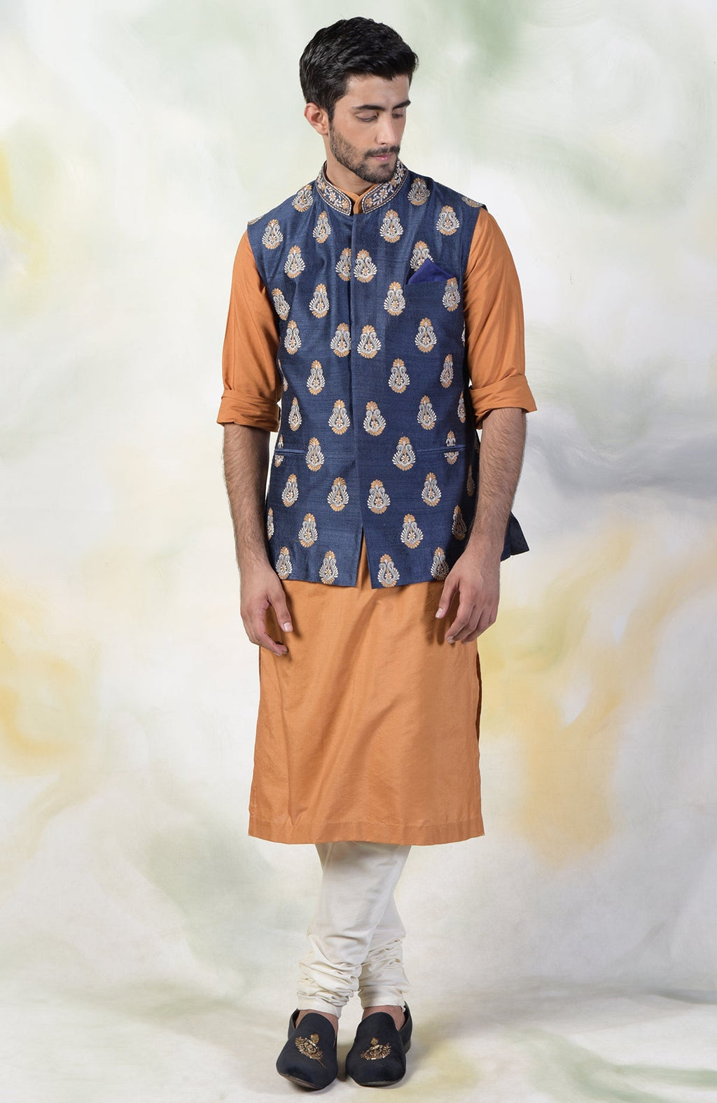 Navy blue silk bandi jacket with gold, ivory, and silver floral embroidery and tonal buttons.