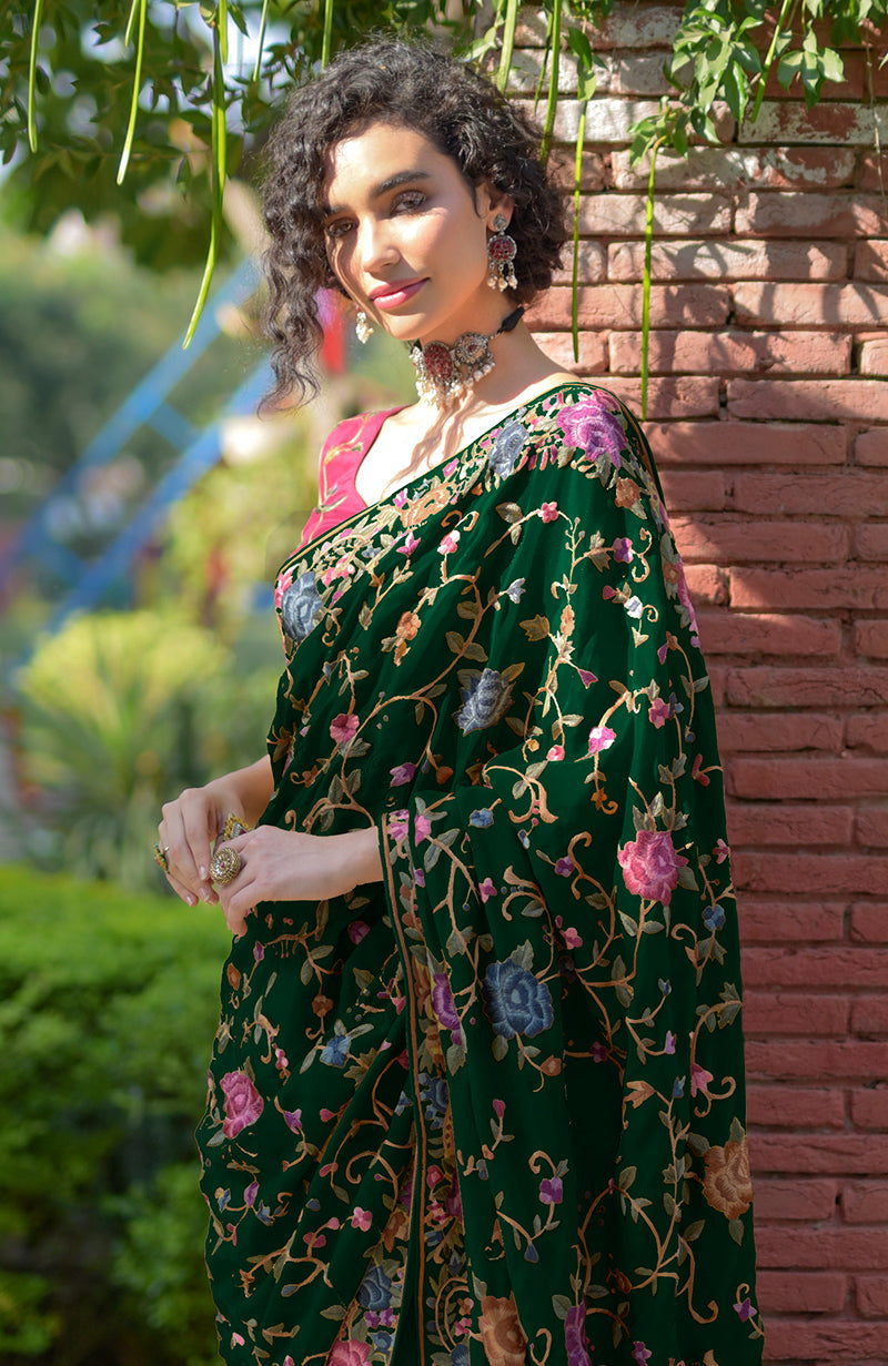 Emerald green floral Parsi Gara hand-embroidered saree.