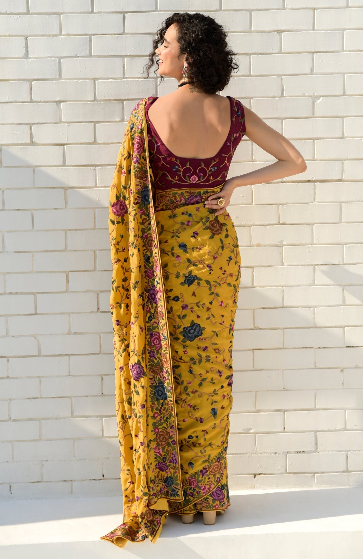 Masterpiece Calendula floral saree with hand embroidered Parsi Gara design and wine blouse piece