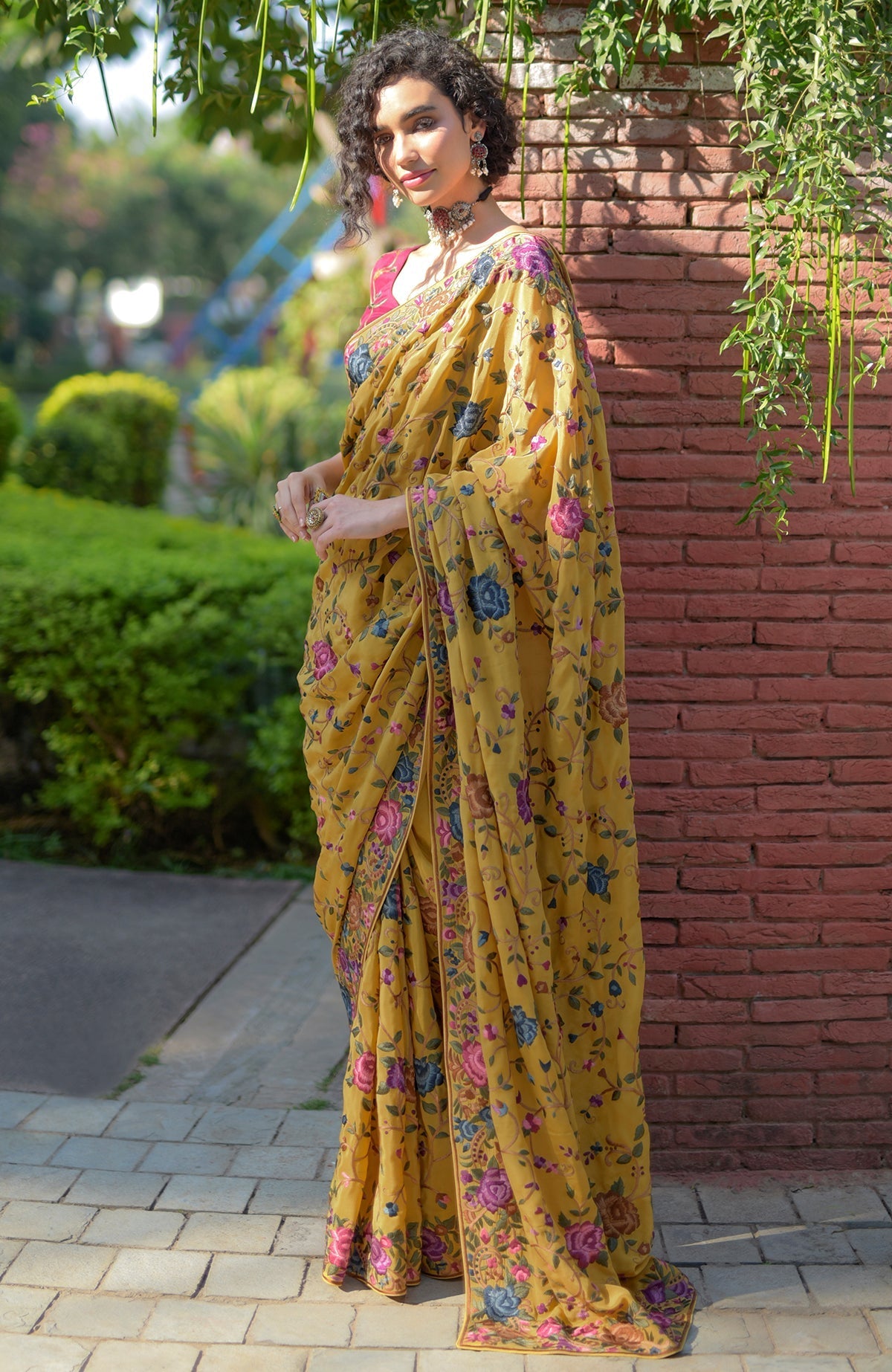 Masterpiece Calendula floral saree with hand embroidered Parsi Gara design and wine blouse piece