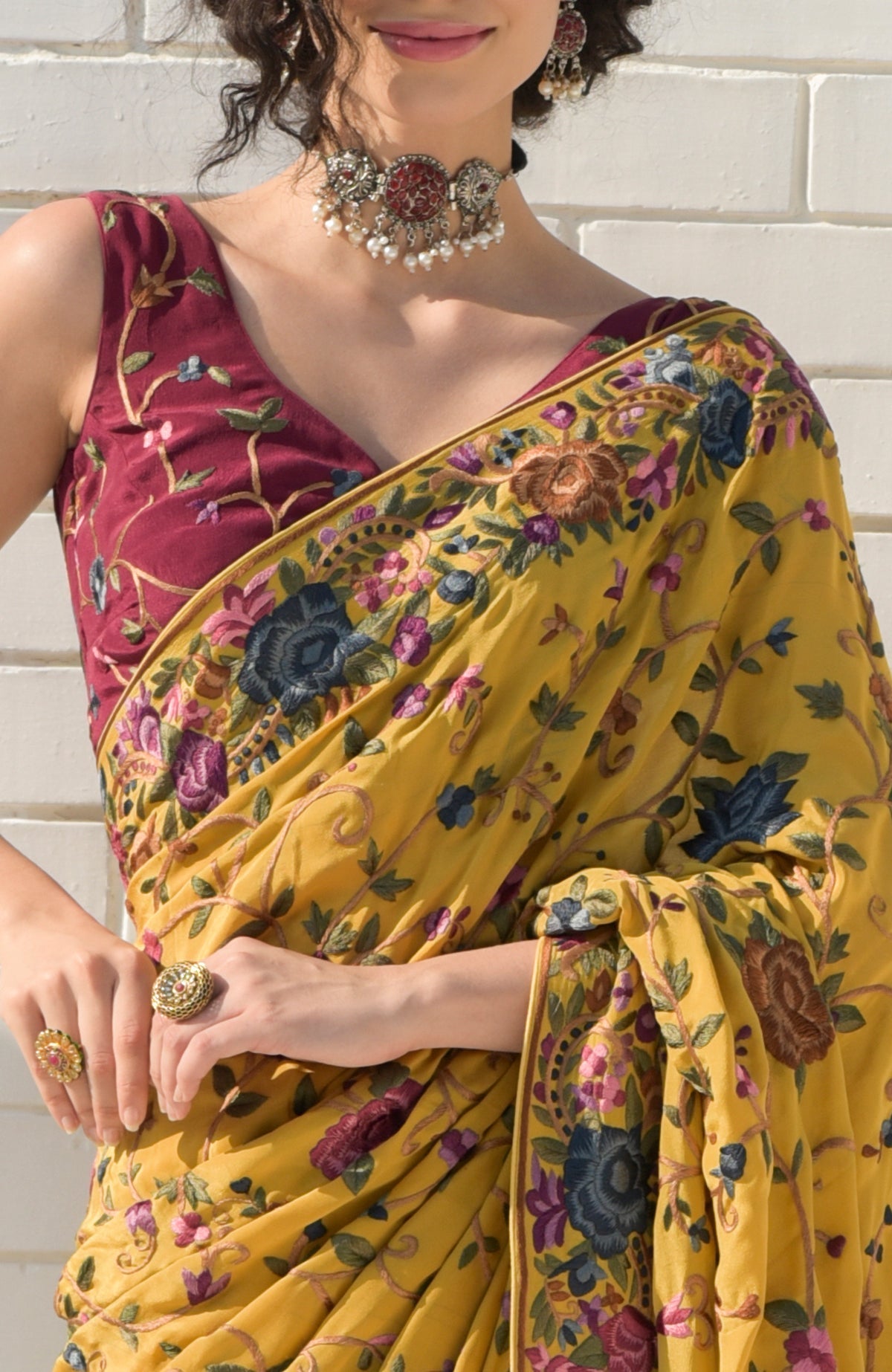 Masterpiece Calendula floral saree with hand embroidered Parsi Gara design and wine blouse piece