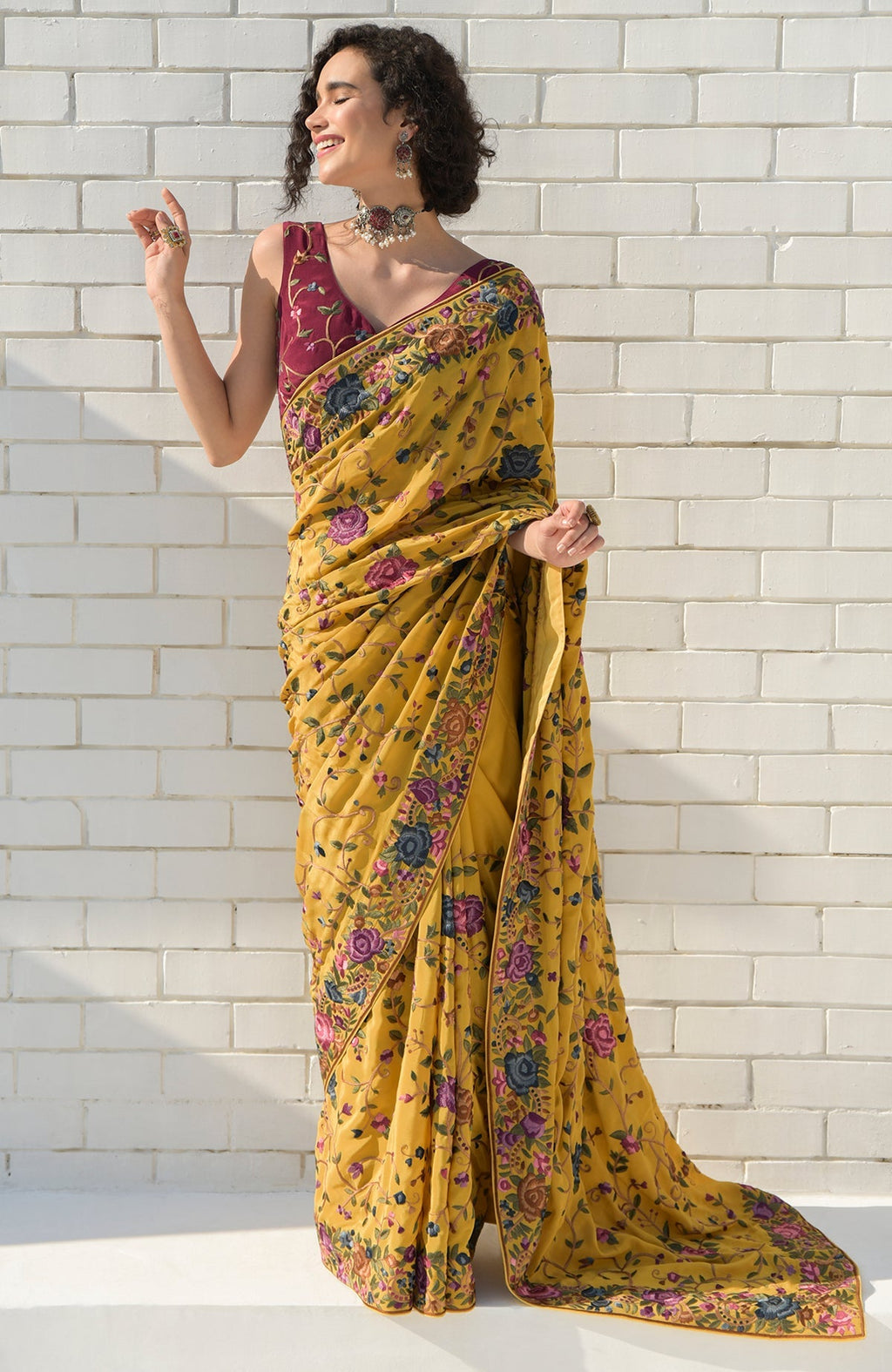 Masterpiece Calendula floral saree with hand embroidered Parsi Gara design and wine blouse piece
