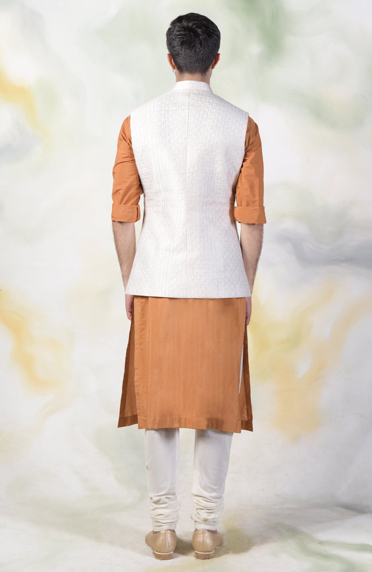 Ivory micro-quilted raw silk bandi jacket with gold buttons for men.