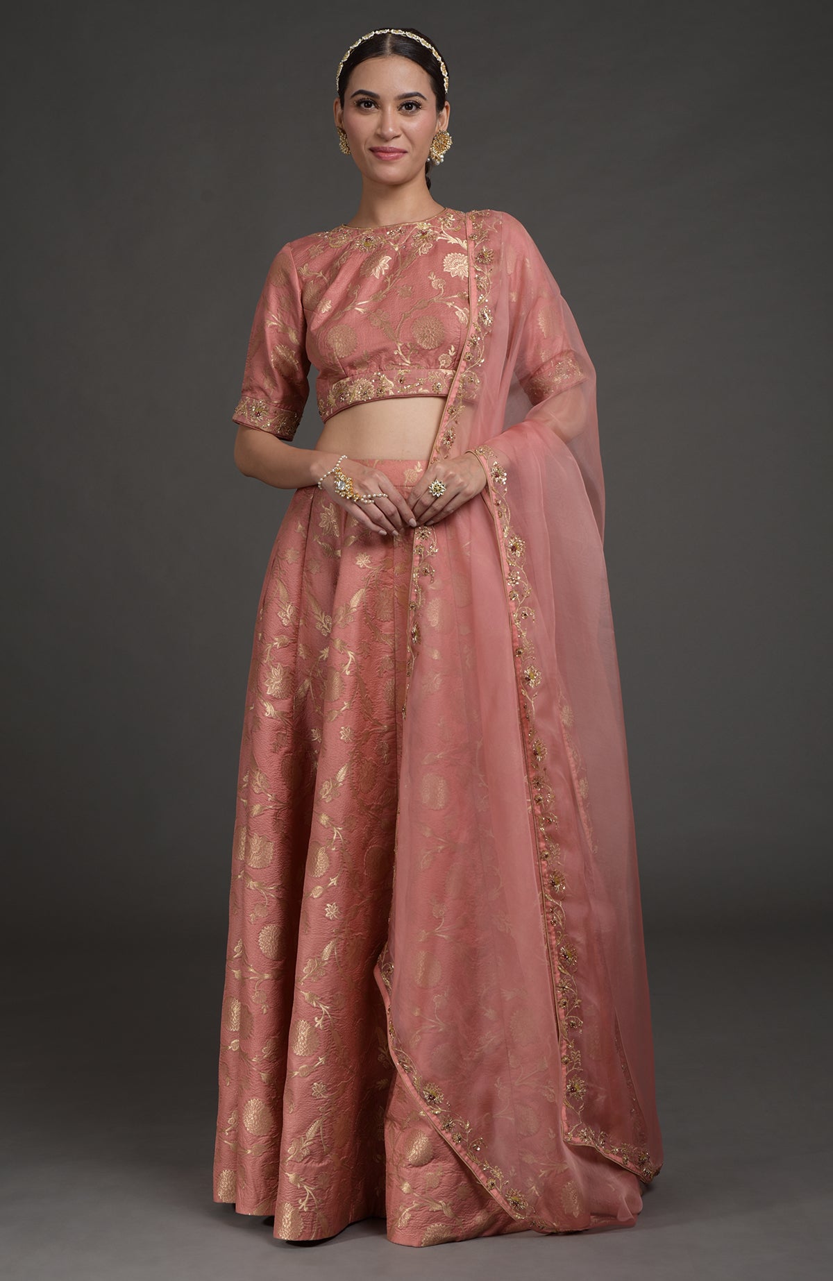 Desert Rose-gold lehenga set with Benares weave and zardozi floral embroidery on blouse and dupatta