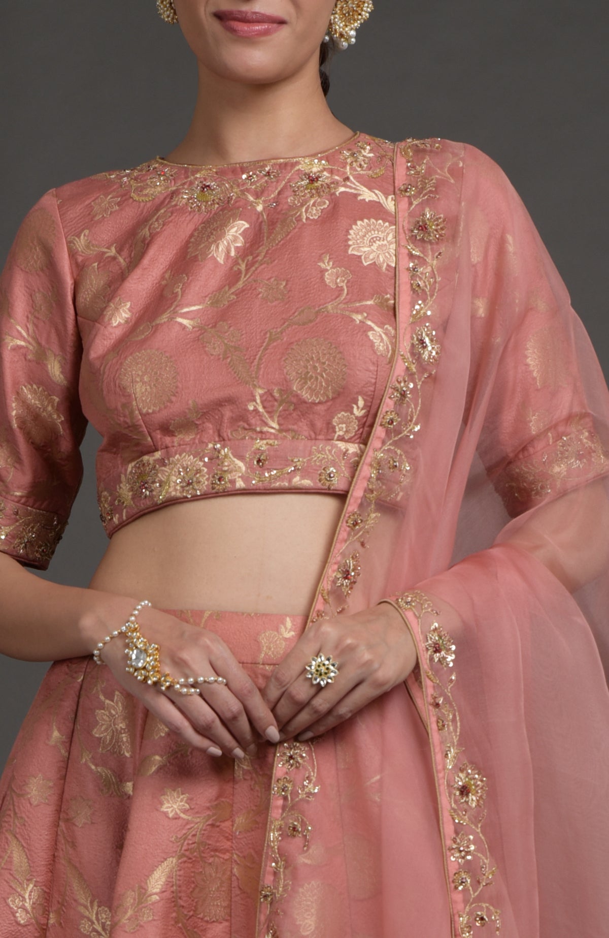 Desert rose-gold Benarasi lehenga set with zardozi embroidery on blouse, lehenga, and dupatta