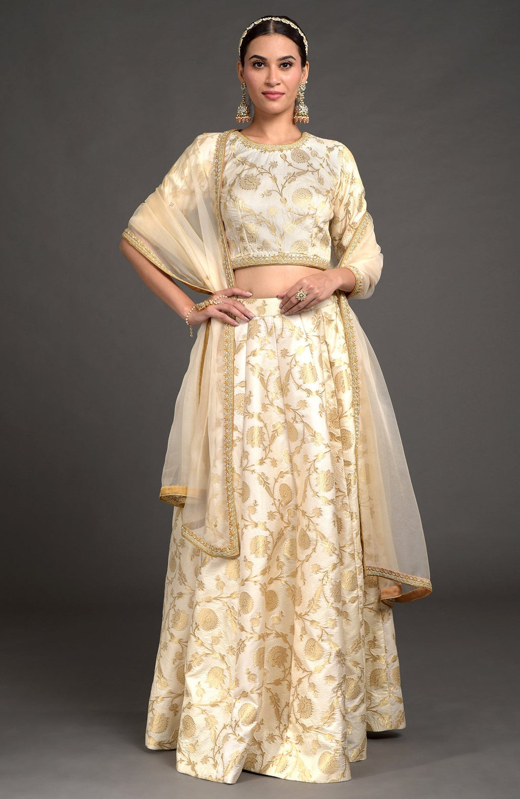 Ivory lehenga set with gold and silver zardozi embroidery and beaded dupatta borders