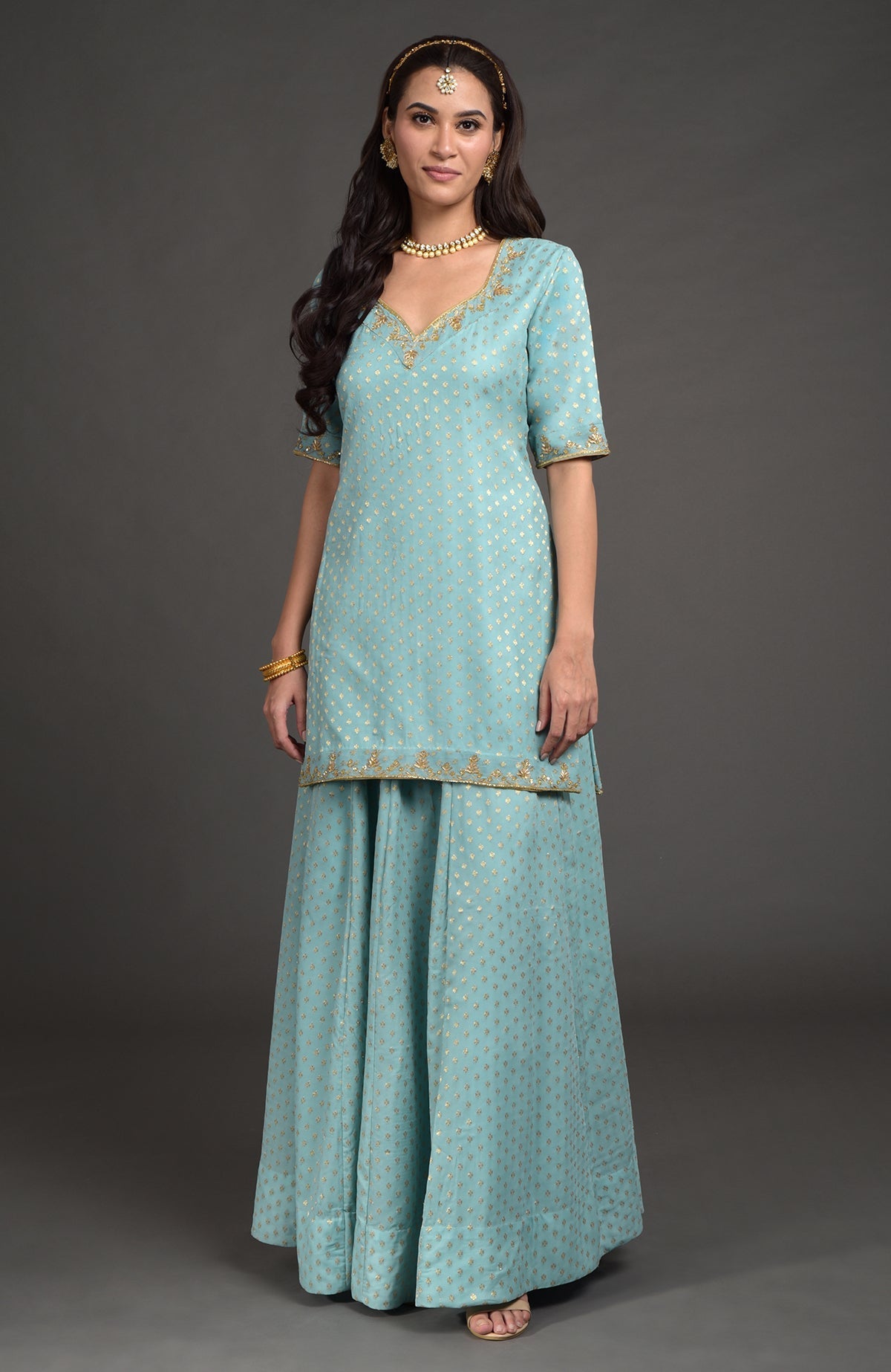 Aqua haze lehenga set with gold Benares weave and floral zardozi embroidery on tunic and dupatta