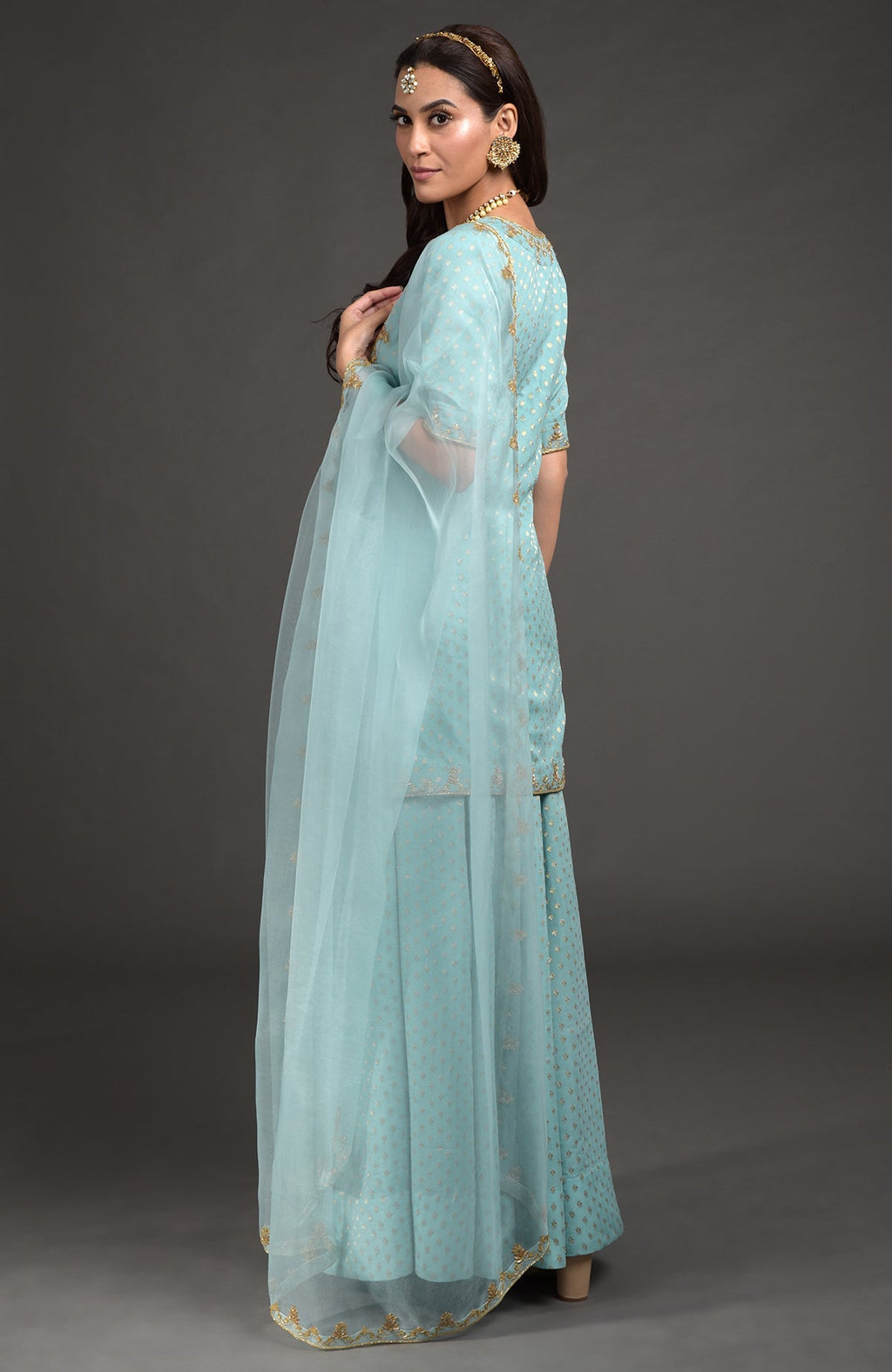 Aqua haze lehenga set with gold Benares weave and floral zardozi hand embroidery