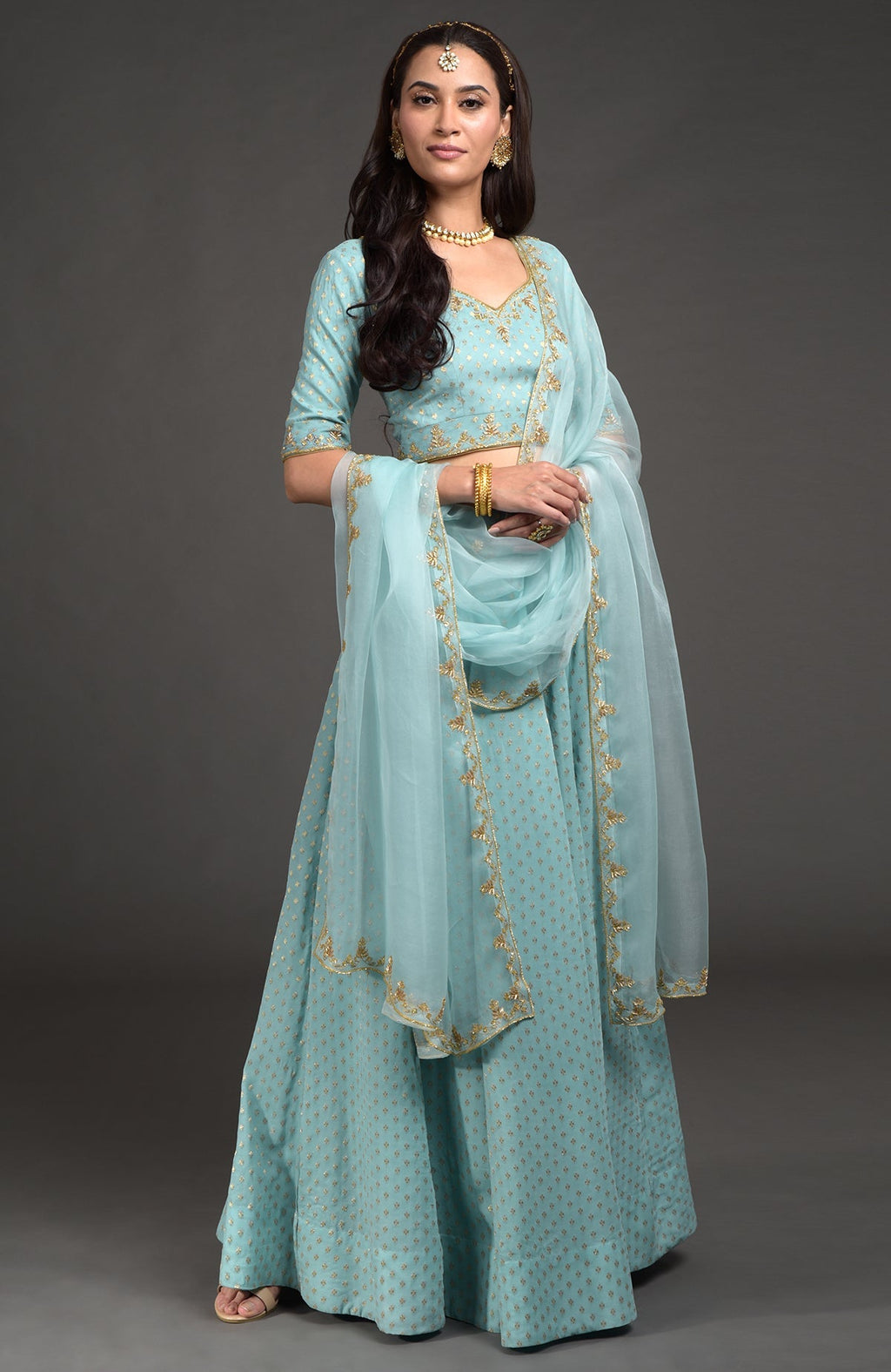 Aqua haze lehenga set with gold Benares weave and floral zardozi hand embroidery on blouse and dupatta