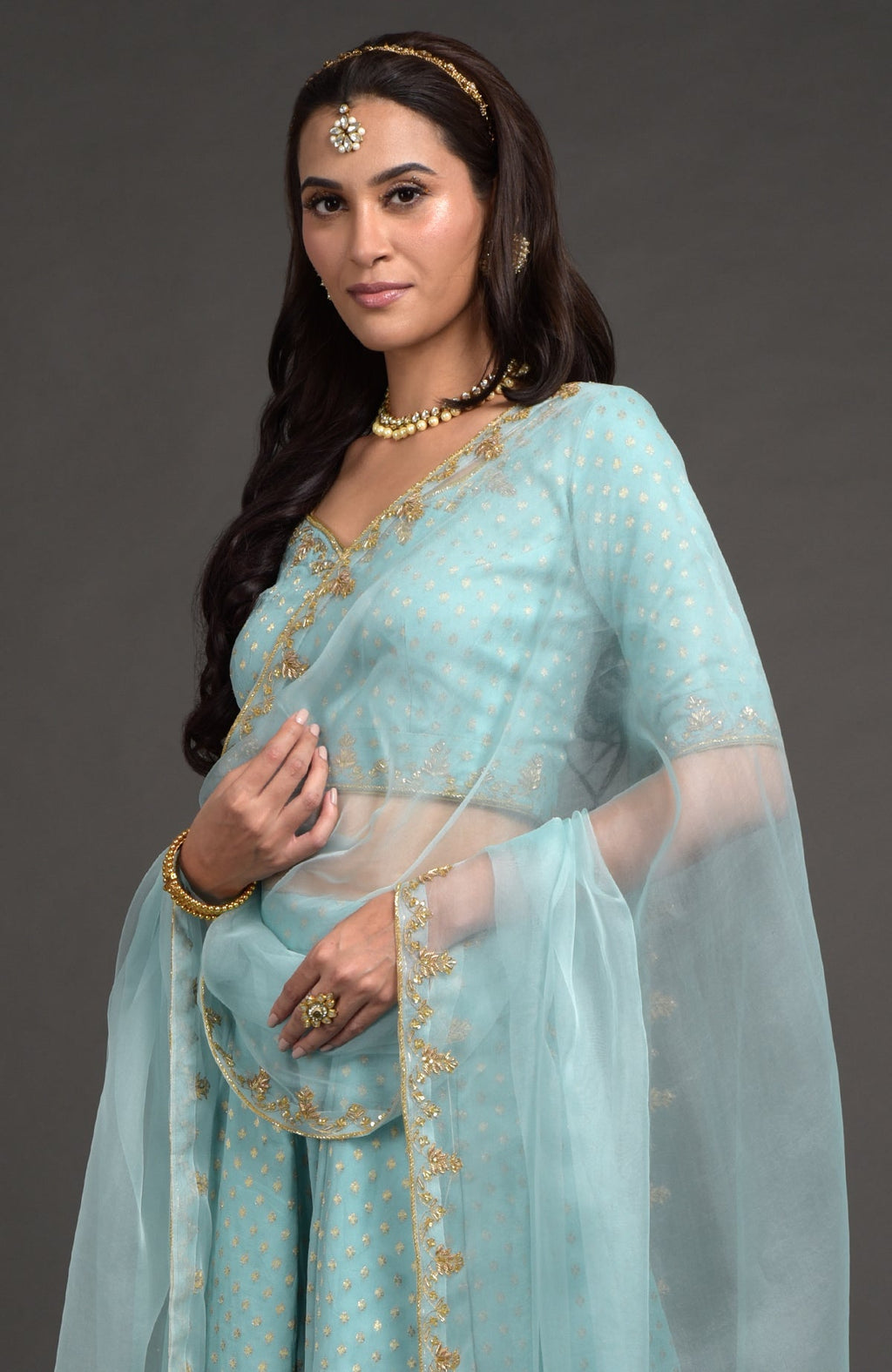 Aqua haze lehenga set with gold Benares weave and floral zardozi hand embroidery on blouse and dupatta