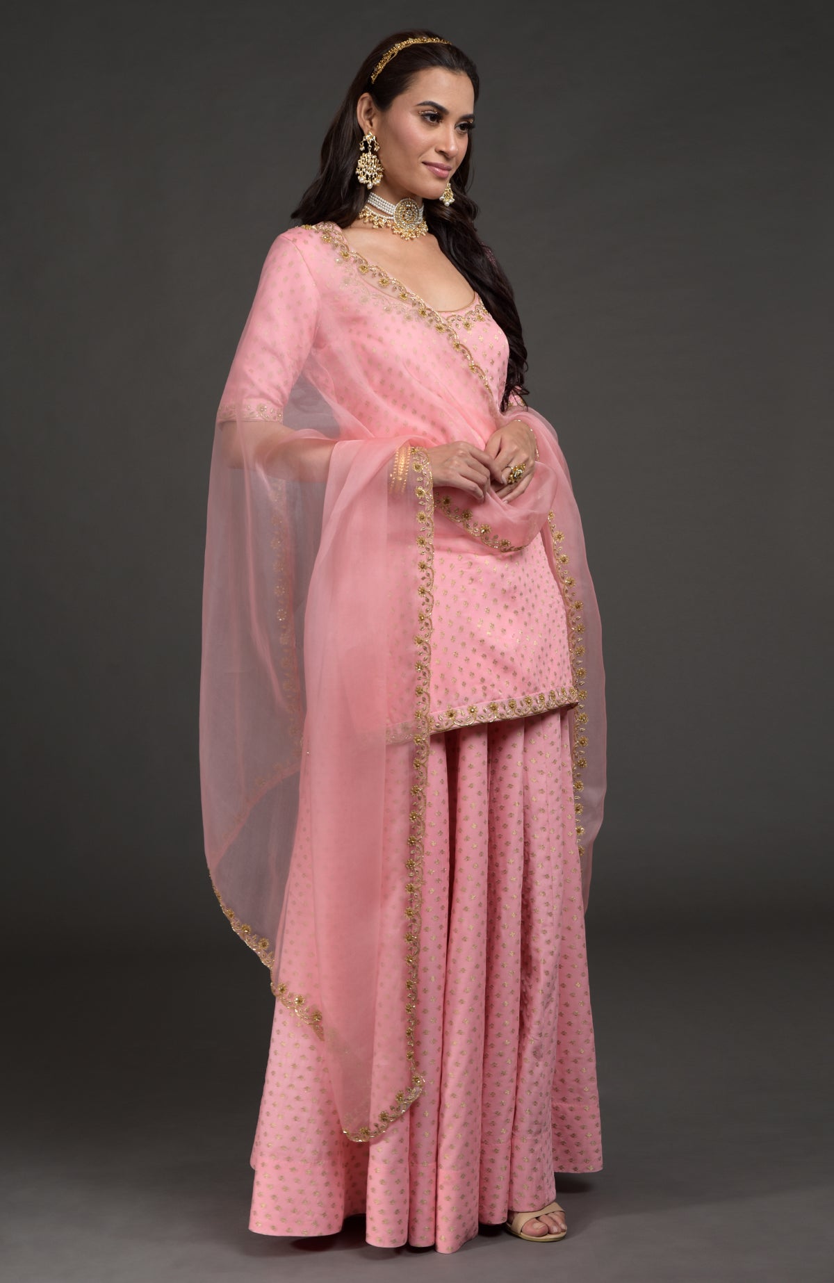 Strawberry pink Benarasi lehenga set with gold zardozi embroidery on tunic, dupatta, and skirt