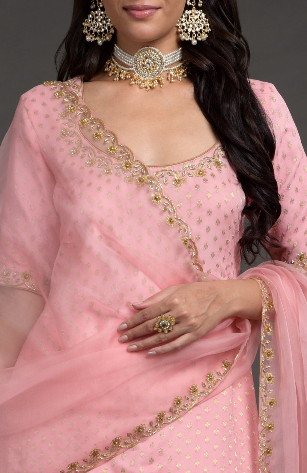 Strawberry pink Benarasi lehenga set with gold zardozi embroidery and floral beaded dupatta.