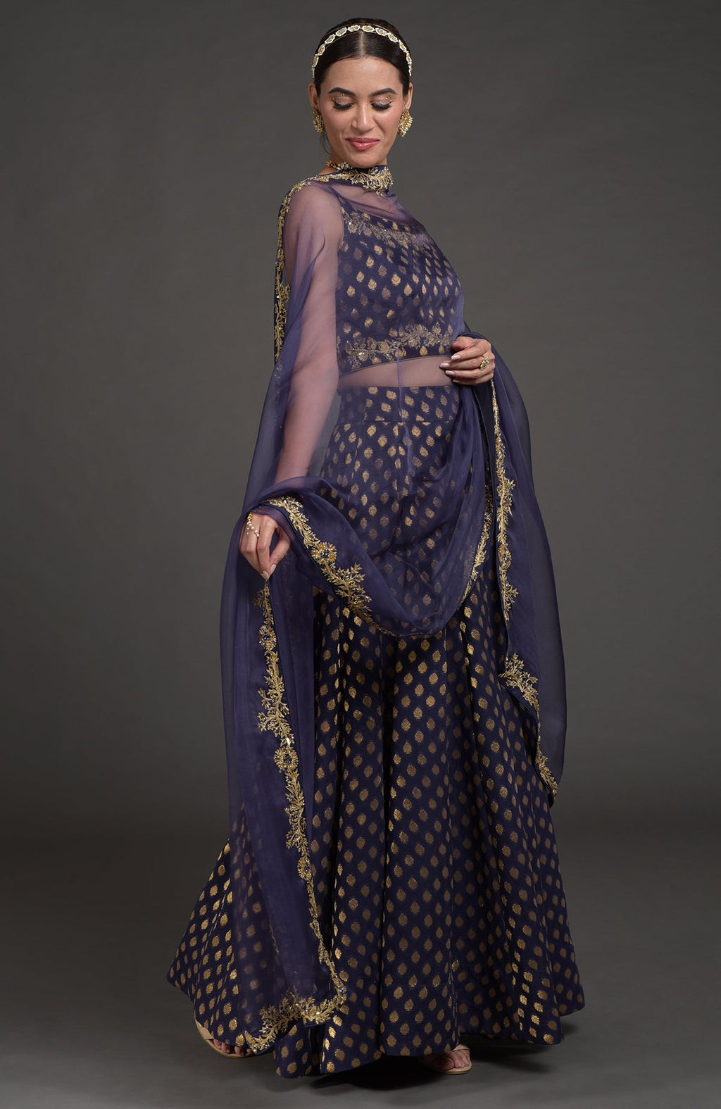 Eclipse blue lehenga set with gold Benares weave and hand embroidered zardozi floral details