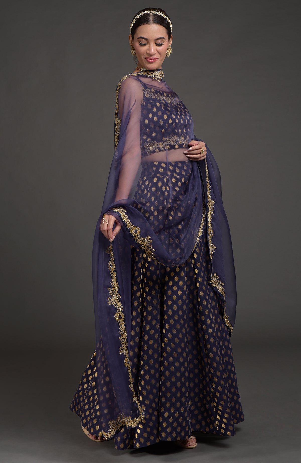 Eclipse blue lehenga set with gold Benares weave and hand embroidered zardozi floral details
