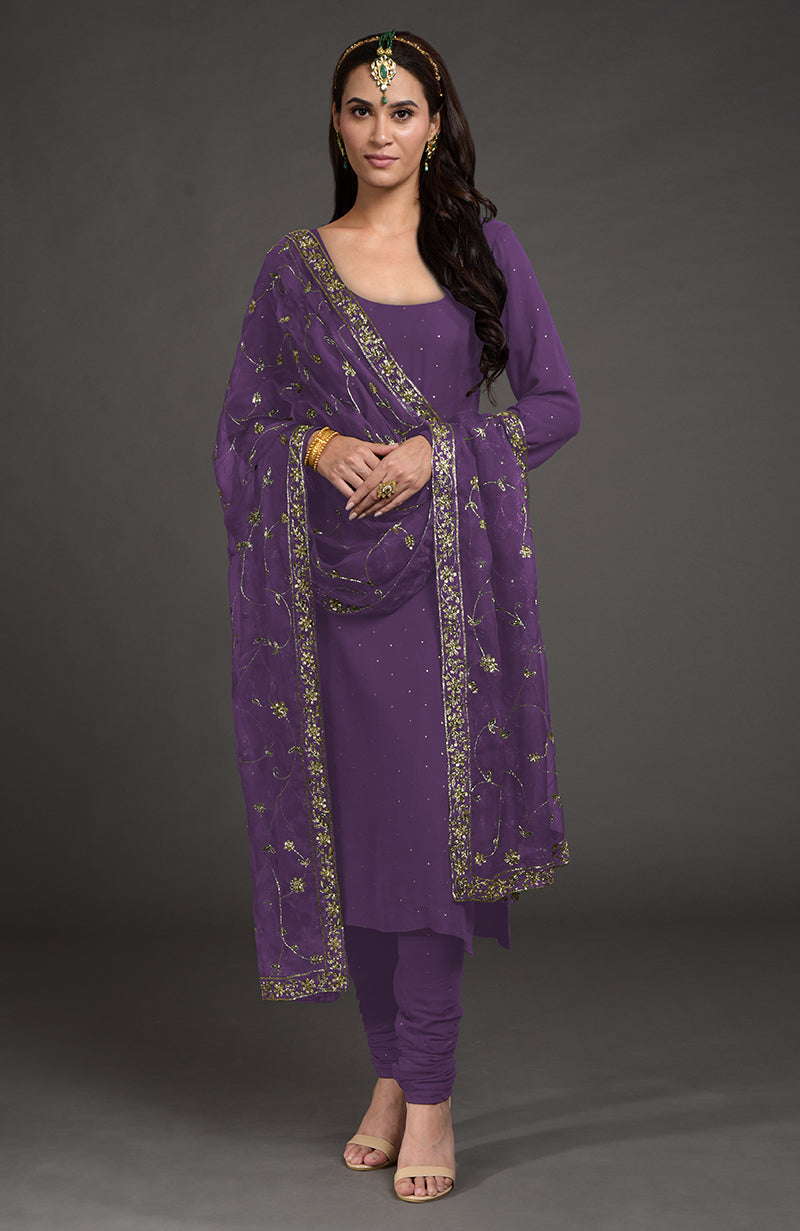 An Amethyst Mukaish-Zardozi Embroidered Kurta Set with a matching dupatta.