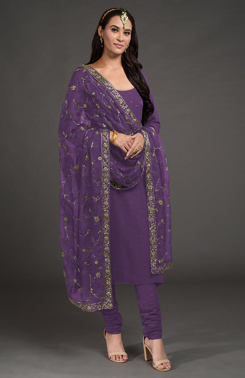 Amethyst kurta set with gold mukaish and zardozi embroidery, paired with a matching dupatta.