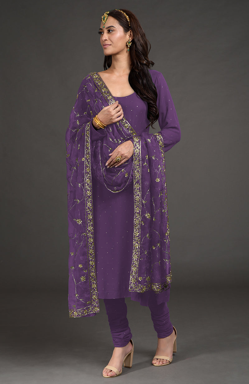 Emerald green georgette kurta with gold mukaish embroidery and organza zardozi dupatta.