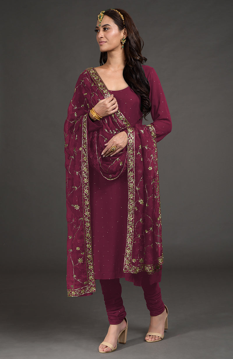 Wine mukaish-zardozi embroidered kurta set with a matching dupatta.