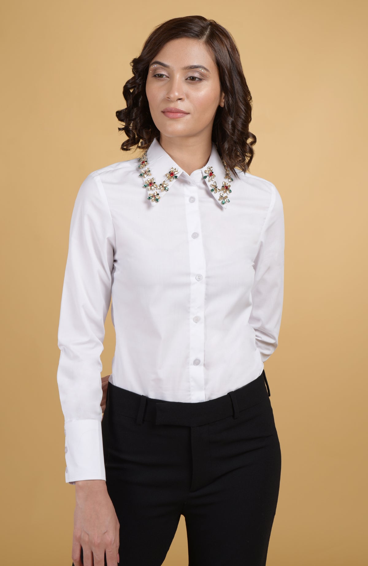White shirt with hand-embroidered jeweled collar in ruby, emerald, and gold crystals