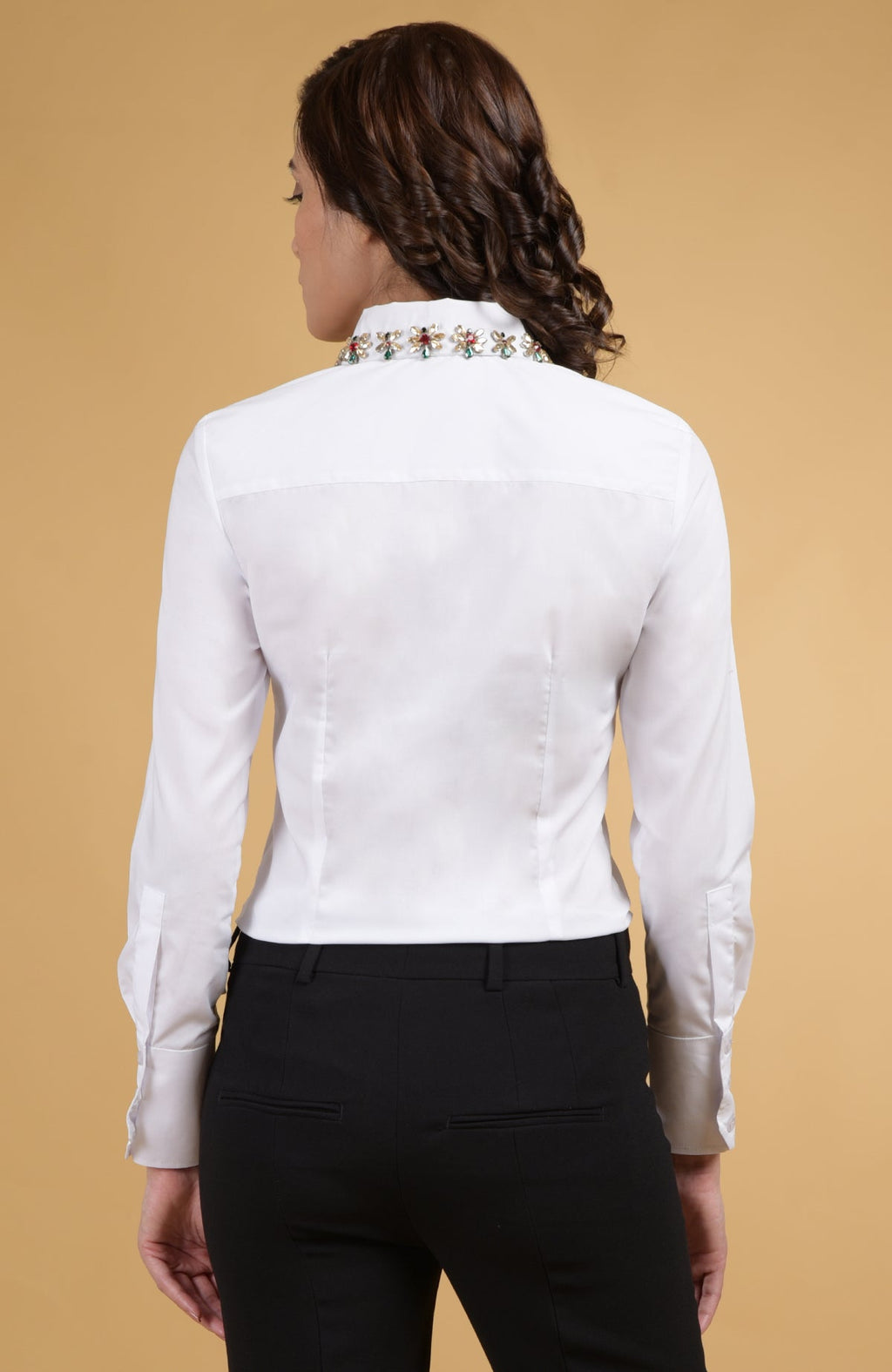 White shirt with hand-embroidered jeweled collar in ruby, emerald, and gold crystals