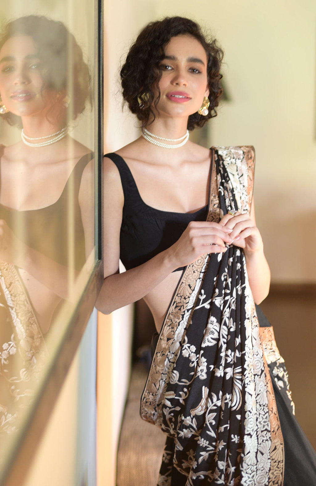 Black Pearl saree with hand embroidered Parsi Gara motifs and three tier border in pearl tones