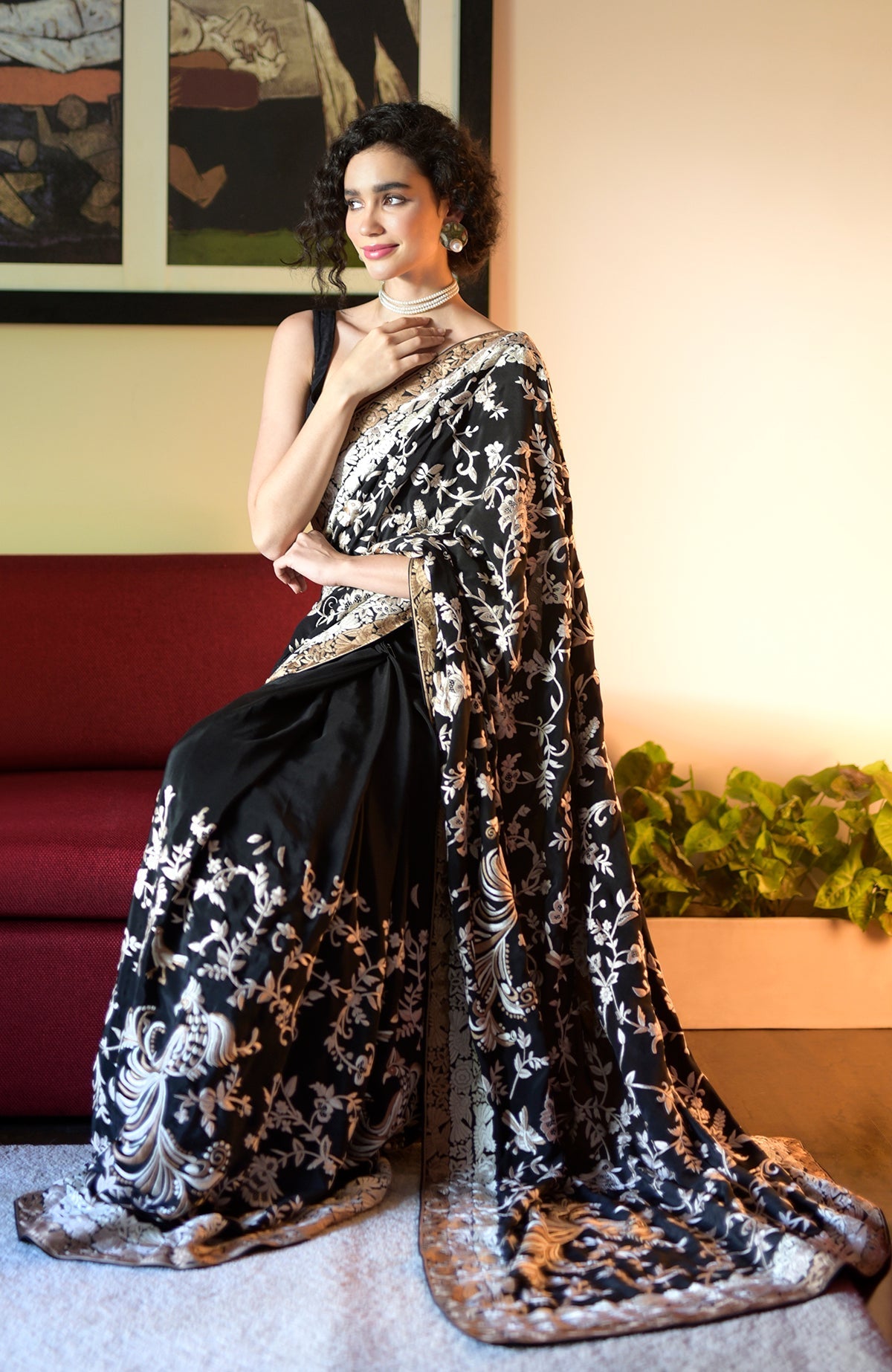 Black saree with hand embroidered Parsi Gara motifs and three tier pearl cream beige border