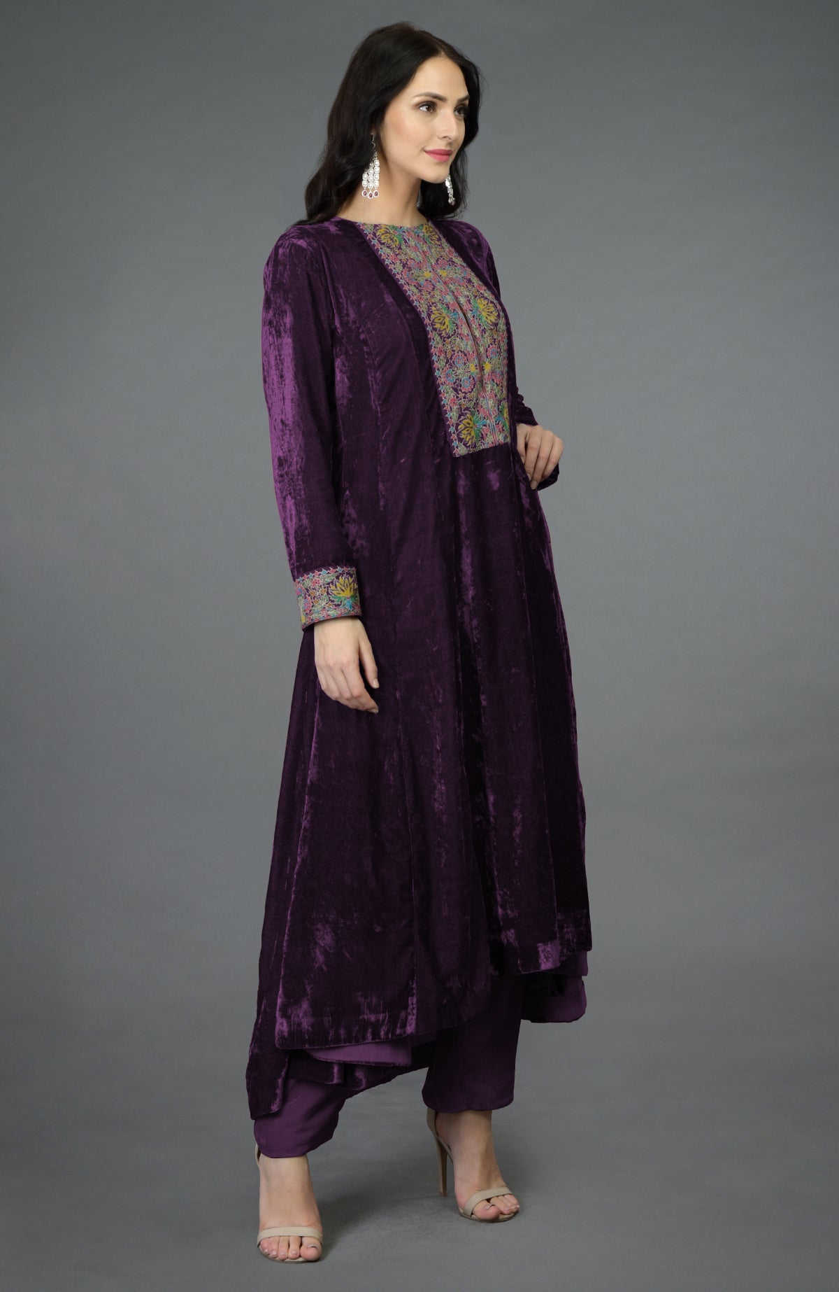 Plum purple silk velvet kalidaar kurta with Kashmiri hand embroidery and asymmetrical hemline