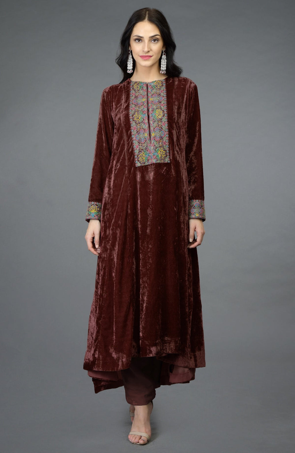 Cabernet silk velvet kalidaar kurta with multicolor Kashmiri hand embroidery and asymmetrical hemline.