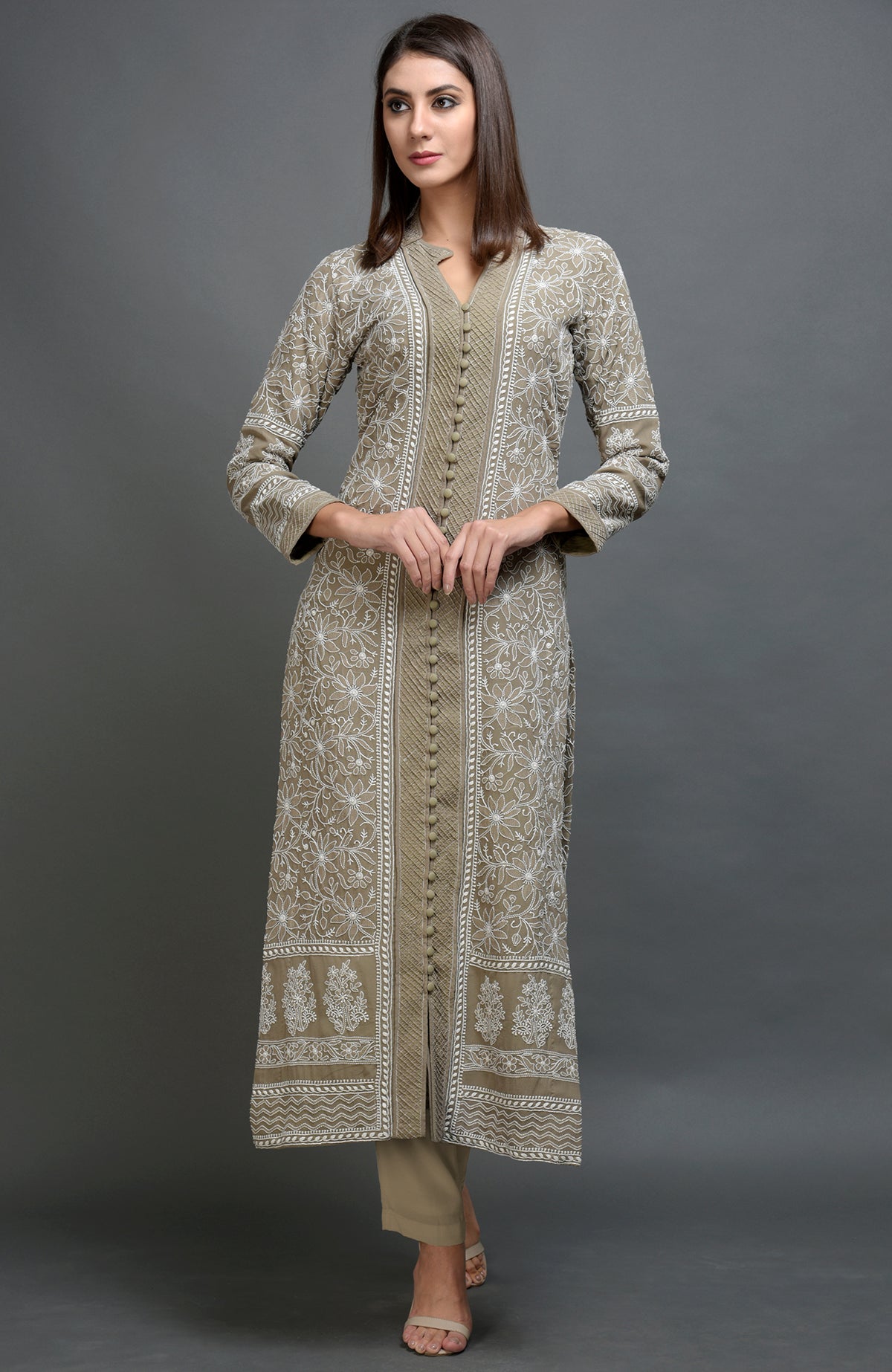 Beige jacket set with intricate chikankari embroidery and matching beige lowers