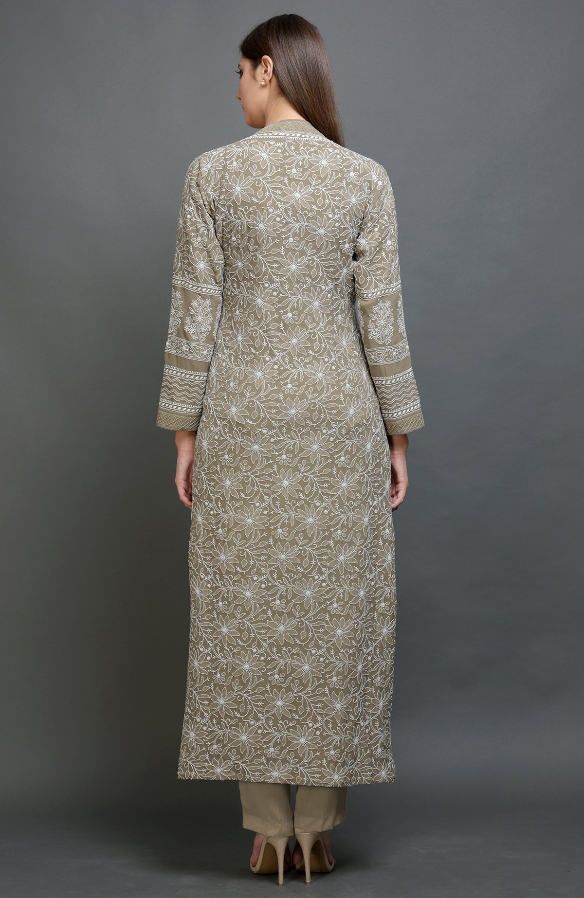 Beige jacket set with intricate chikankari embroidery, notch collar, and matching beige pants