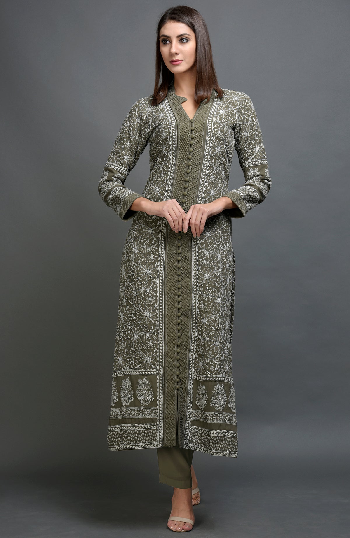 Olive green chikankari embroidered jacket with notch collar and matching pants set.