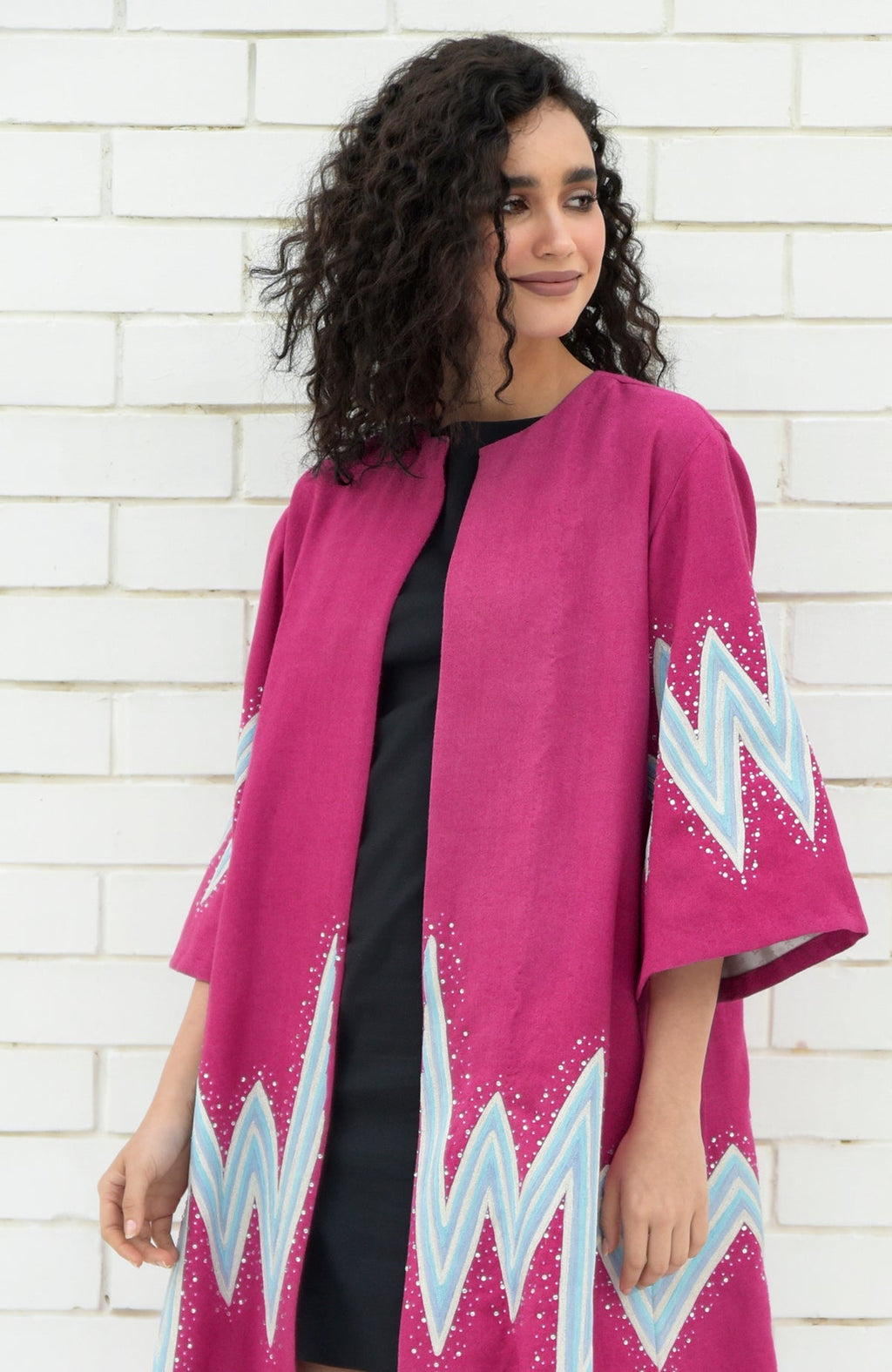 Fuchsia-purple wool kimono jacket with embroidered chevron motifs and Swarovski crystal accents
