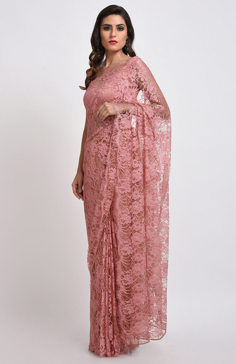 Peach rose saree made of French Chantilly lace with matching satin blouse fabric visible.