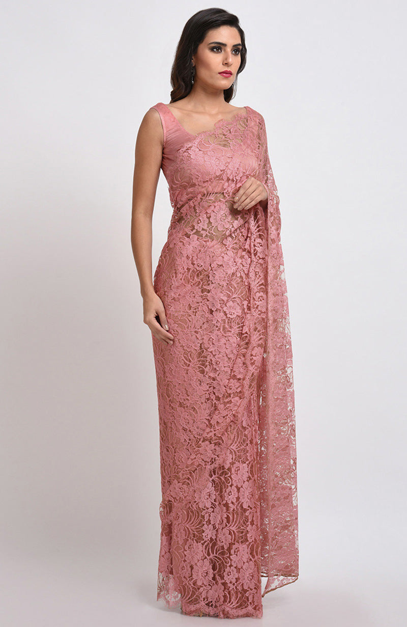 Peach rose saree made of French Chantilly lace with matching satin blouse fabric visible