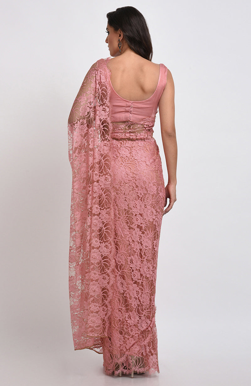 Peach rose saree made of French Chantilly lace with matching satin blouse fabric.