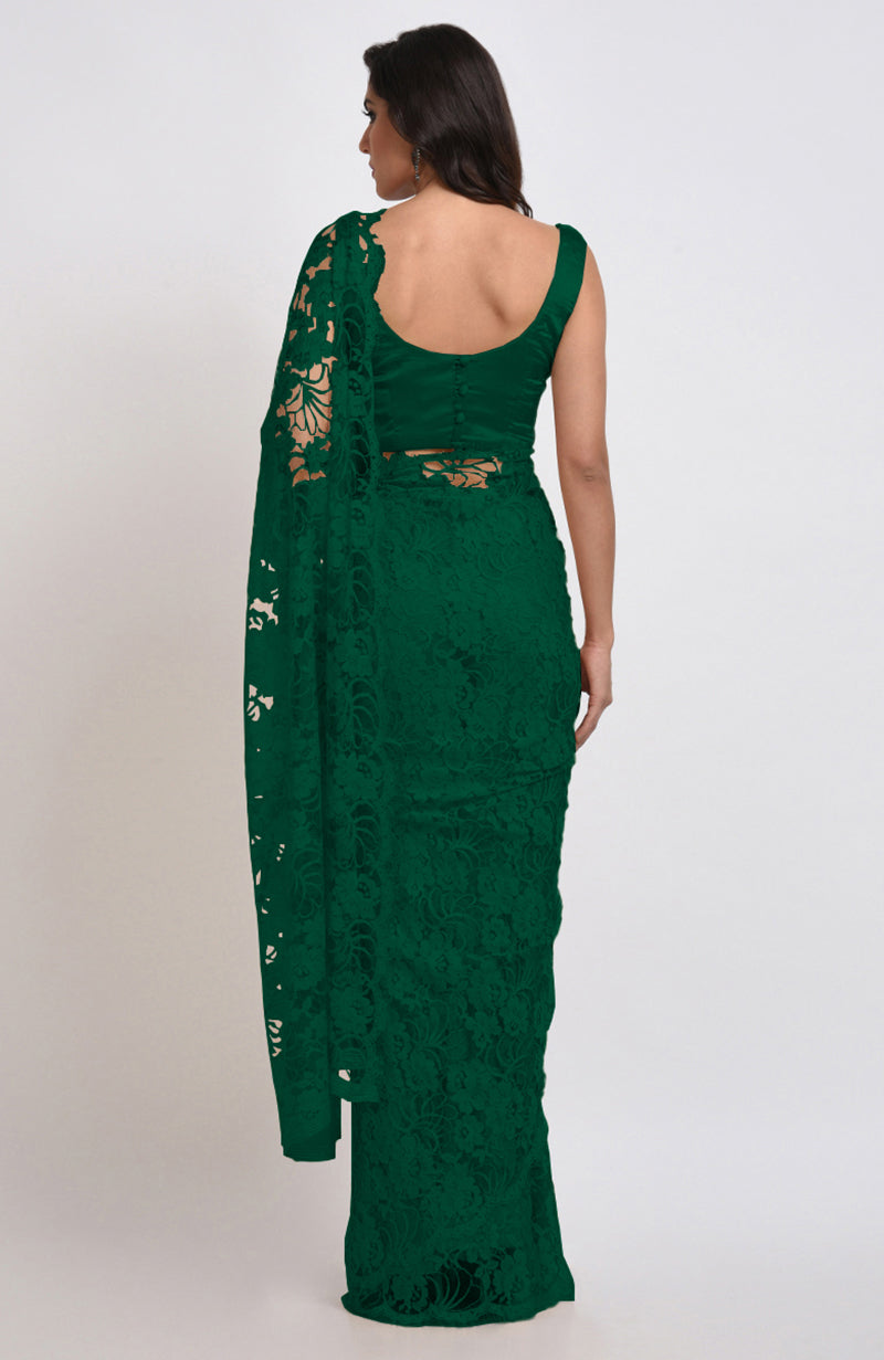 Emerald green Chantilly lace saree set with a matching blouse.