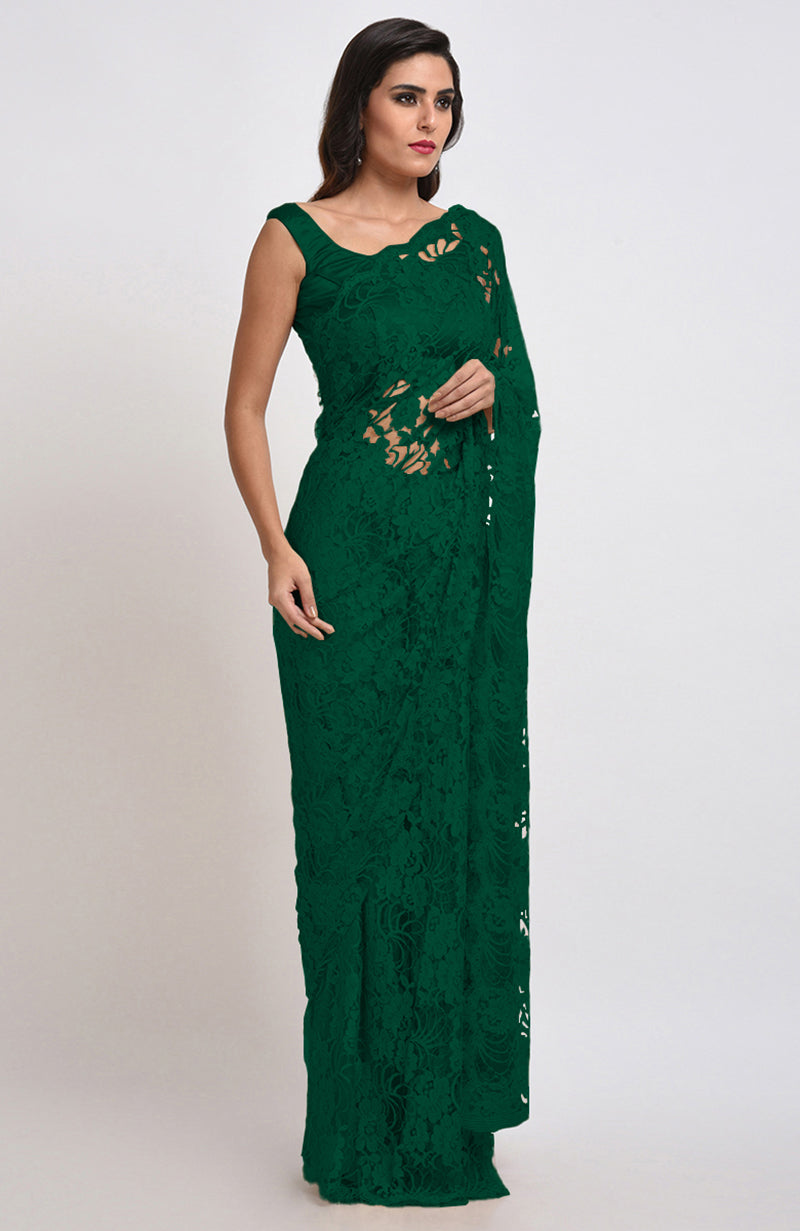 Emerald green Chantilly lace saree set with a matching blouse.
