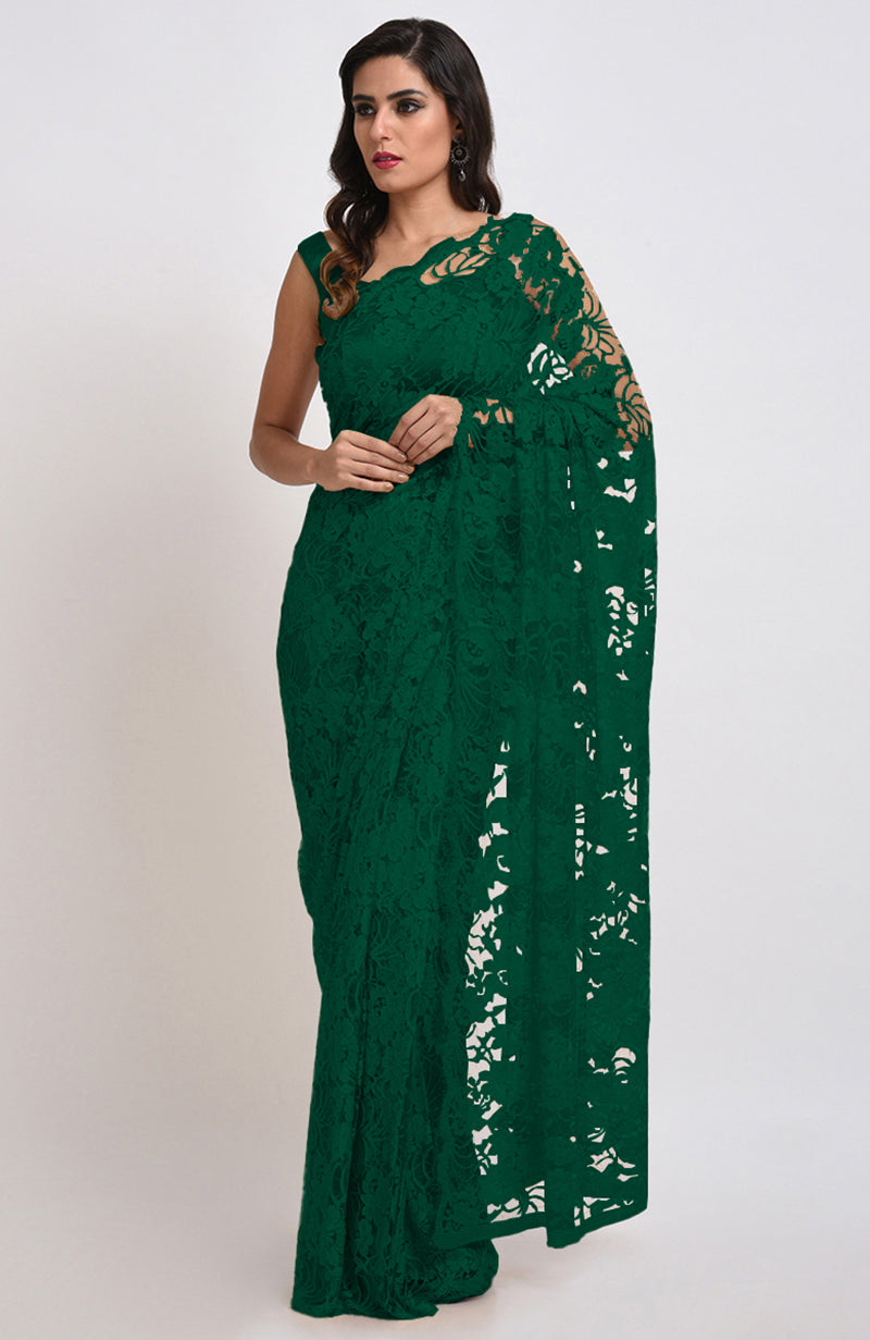 Emerald green Chantilly lace saree set with a matching satin blouse.