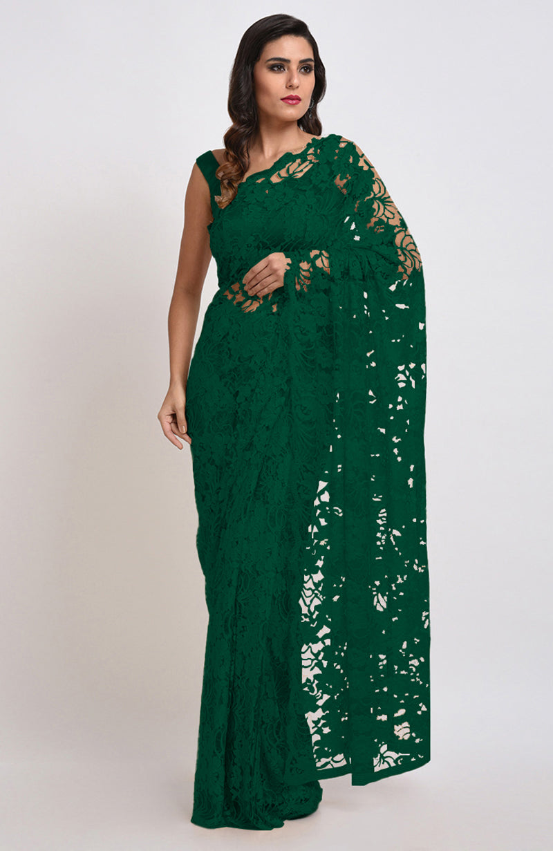 Emerald green Chantilly lace saree set with a matching blouse.
