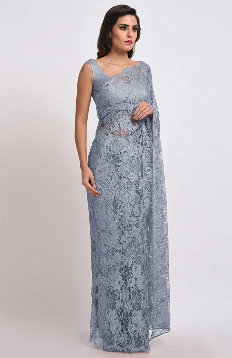 Blue gray Chantilly lace saree set with a matching satin blouse.