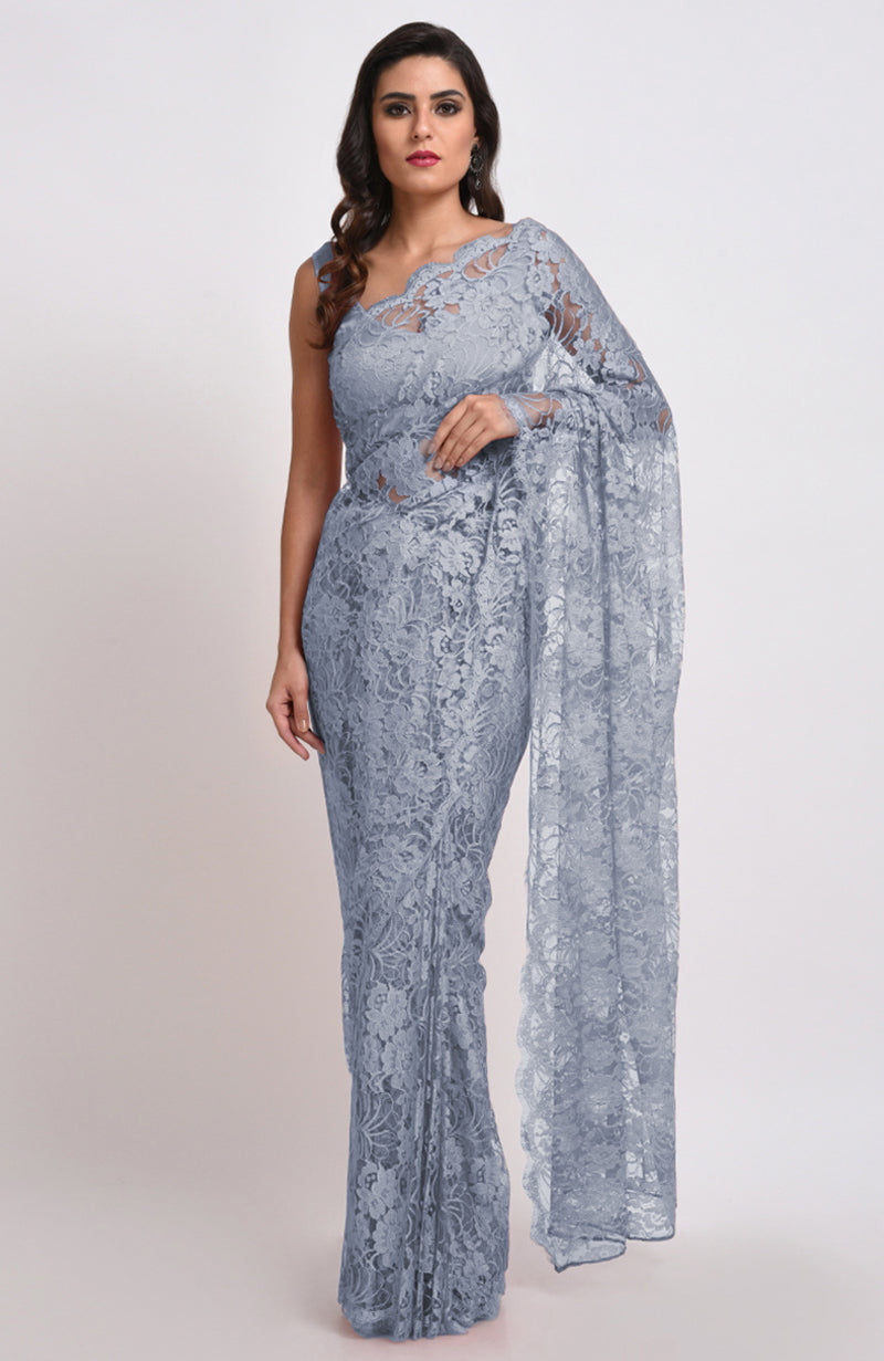 Blue gray Chantilly lace saree set with a matching blouse.