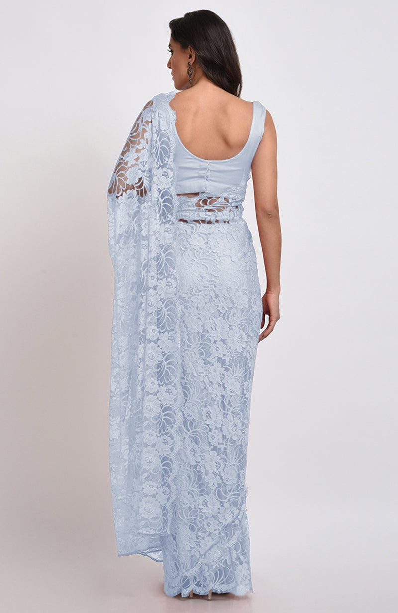 Illusion blue French Chantilly lace saree set with a matching satin blouse.