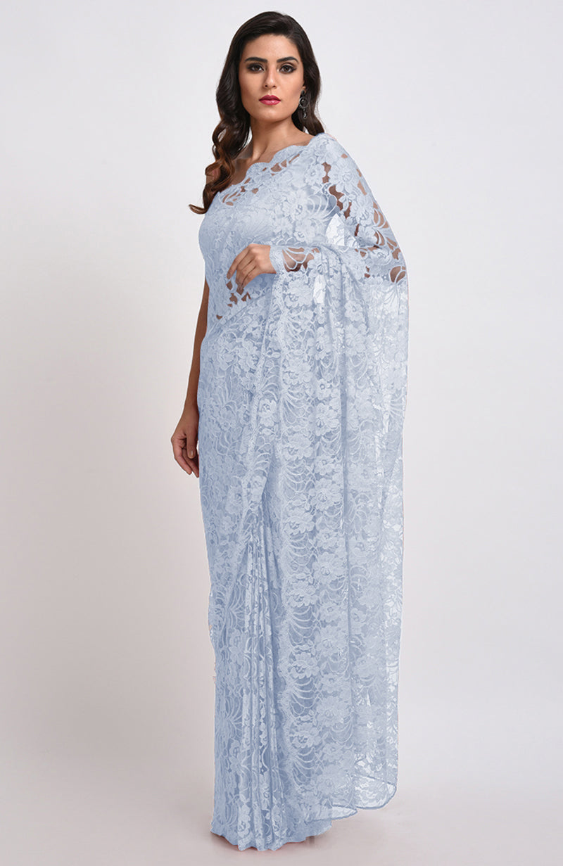 Illusion blue French Chantilly lace saree set with a matching blouse.